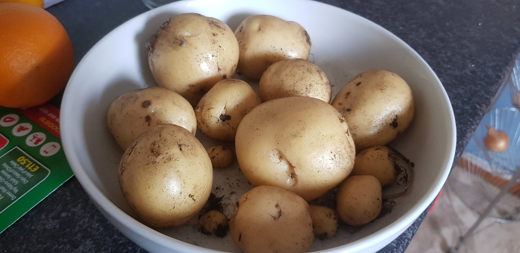 A bowl of home-grown potatoes from some plants that me and my father planted in Mid-May.