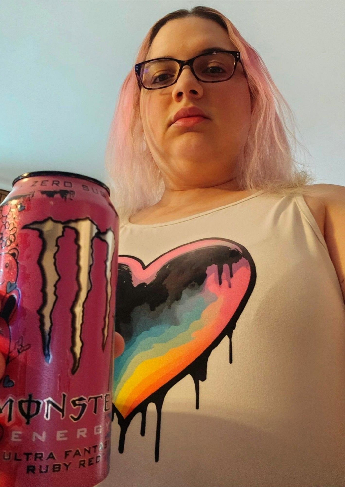 Your Top Trans Mommy holds up your 3rd can of unfinished Monster Energy, a look of disappointment in her eyes