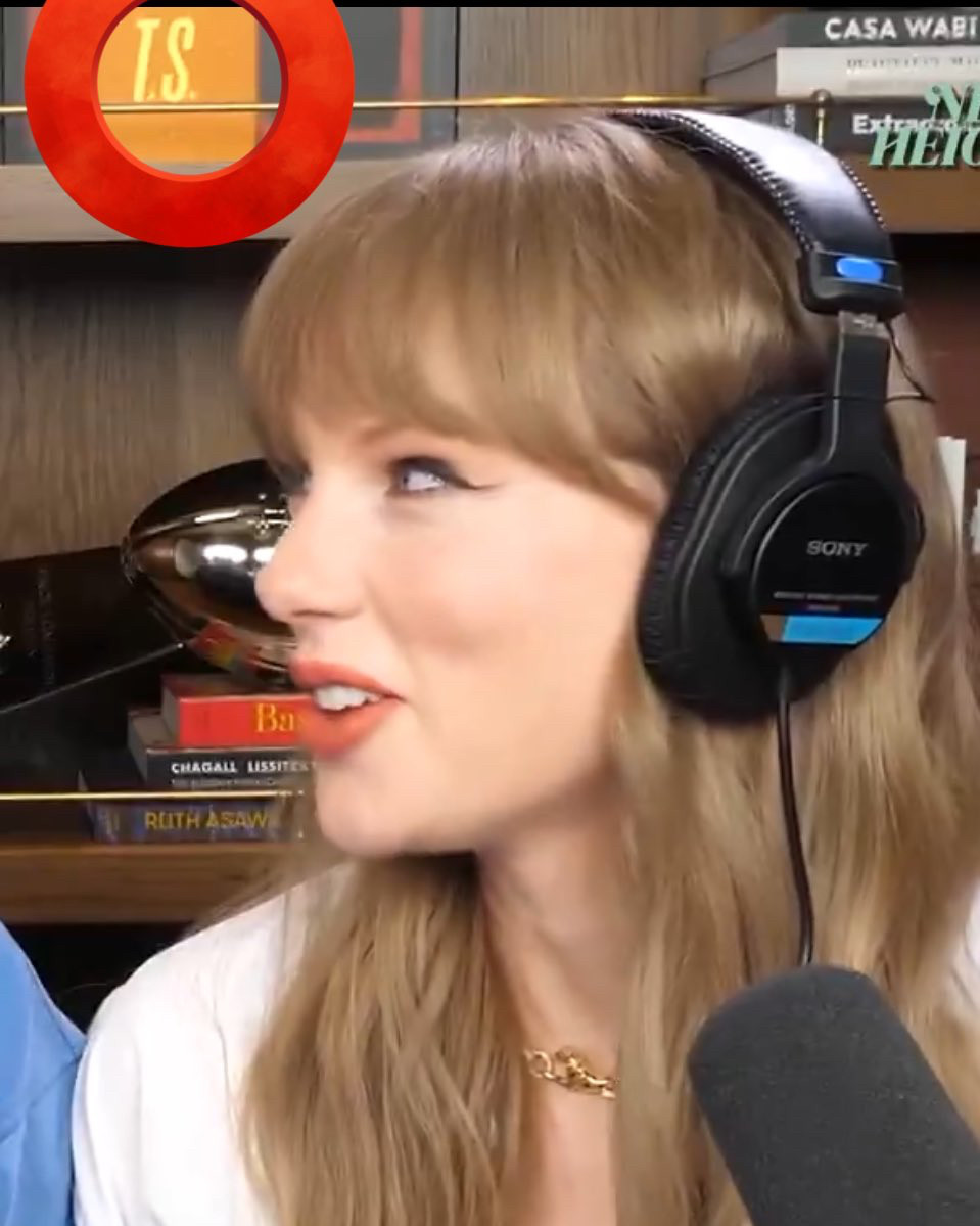 Screenshot of Taylor Swift’s preview as a guest on the “bew heights” podcast showing a TS on a orange cover on the background 