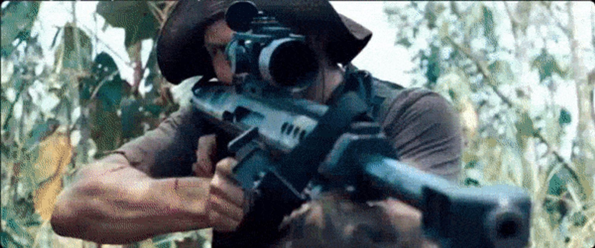 a sniper in Rambo 2008 shooting a guy's head off