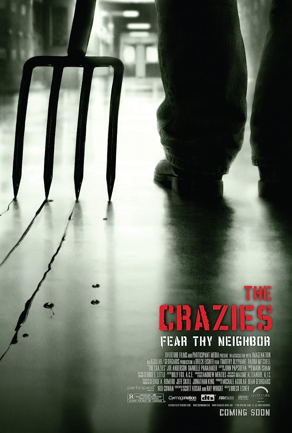 A poster of the 2010 remake of The Crazies, featuring a close-up of the back of a man's legs as he drags a bloody pitchfork along the ground. The tagline states, "FEAR THY NEIGHBOR."