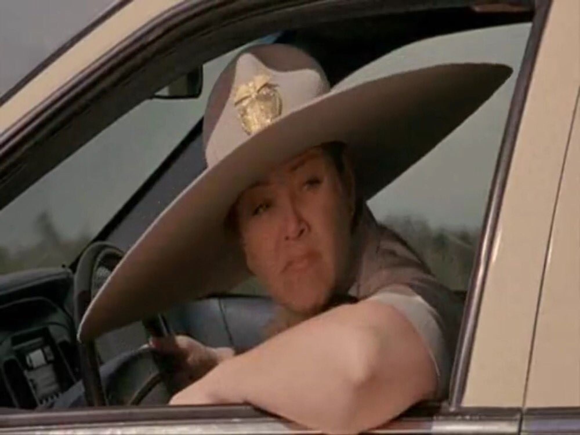 From Scary Movie 3, a woman wearing a giant hat.