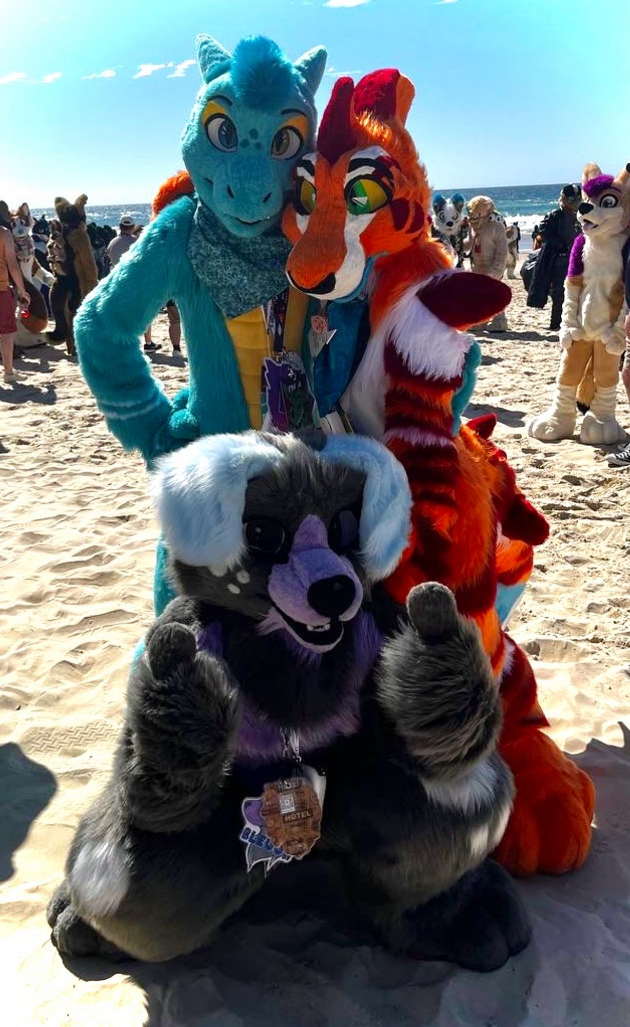 3 Fursuiters posing for a photo on the beach at Furdu 2024