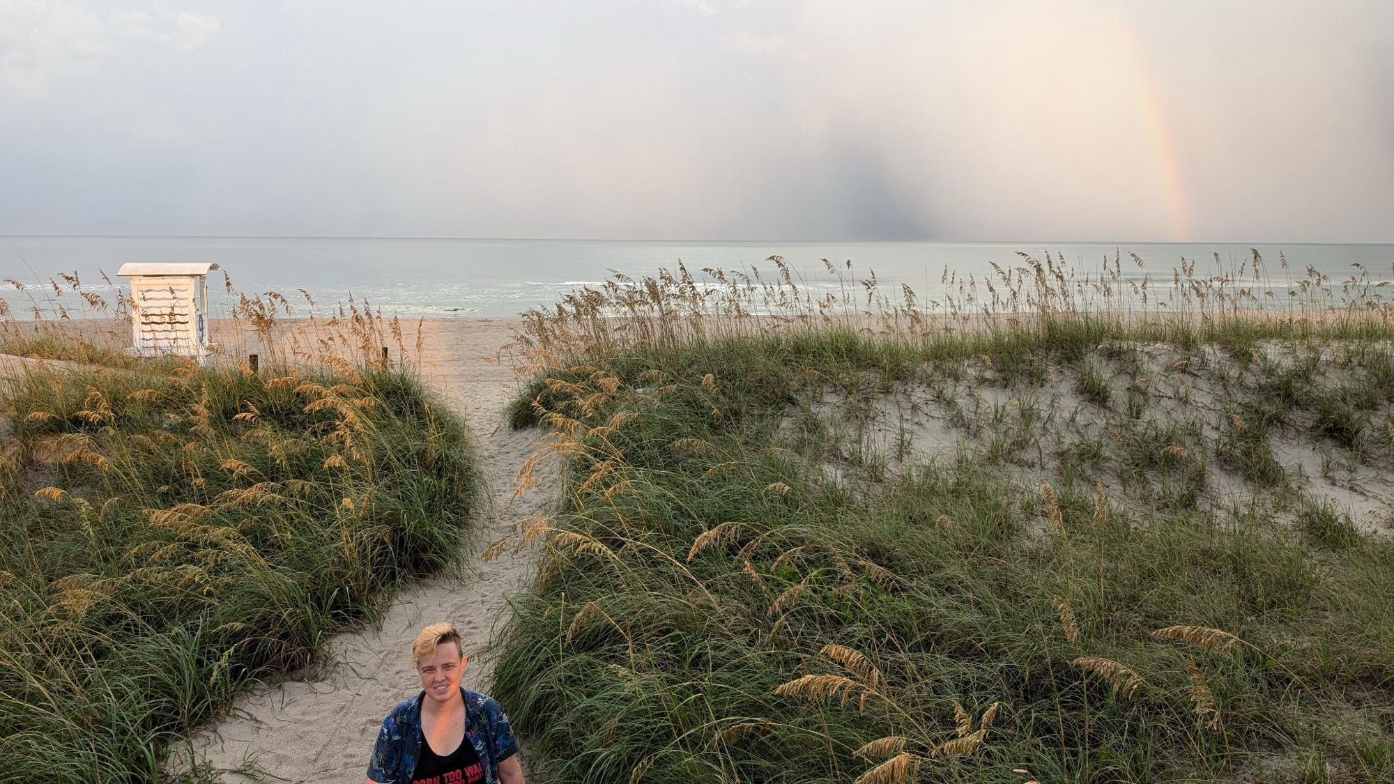 me at beach with rainbow