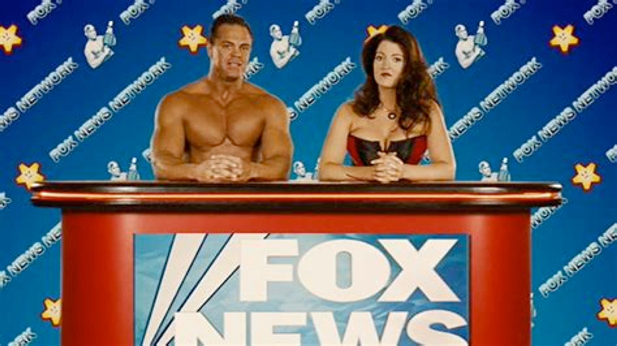 In America's stupid future, Fox News anchors are a shirtless bodybuilder and a lingerie model in a bodice.