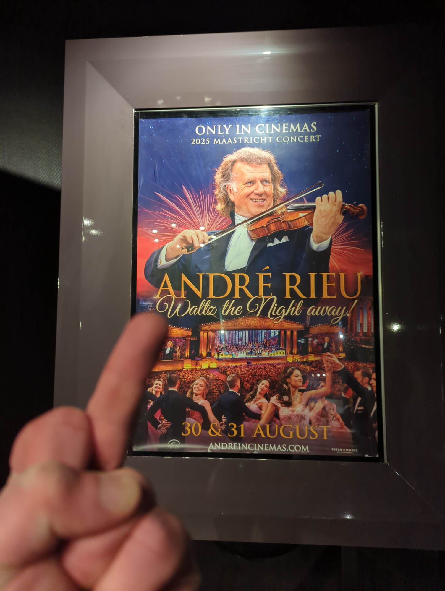 Me flipping off a theatrical release poster for André Rieu's “Waltz the Night Away!”, a live concert recorded (or streamed) to cinemas for a 2-night release (August 30—31).