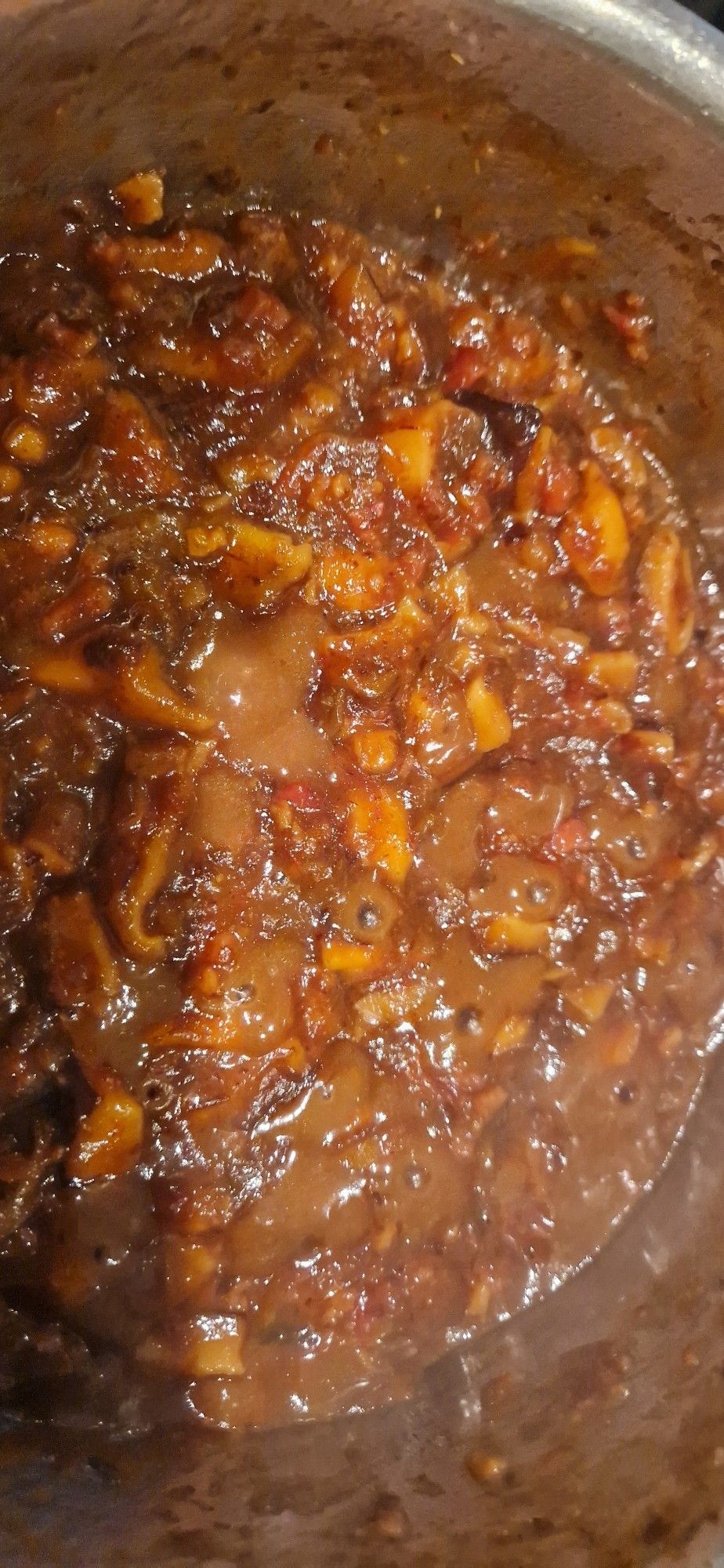 Mushroom (forrest assortiment and shitakes) chutney simmering in a pot.