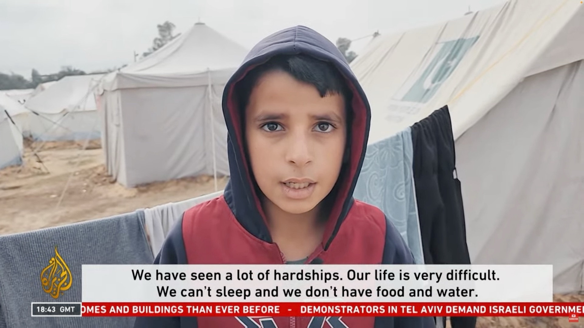 A boy saying: “We have seen a lot of hardships. Our life is very difficult. We can’t sleep and we don’t have food and water.”