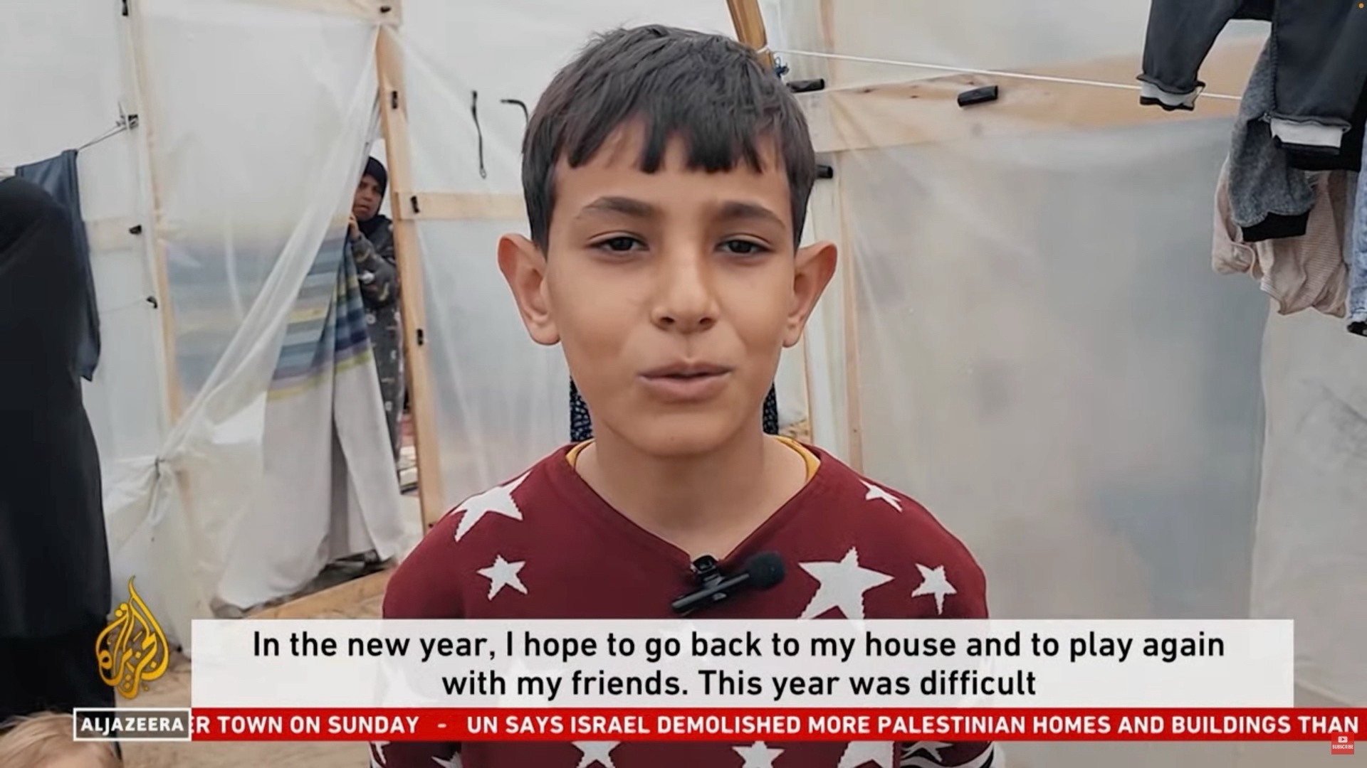 A boy saying: “In the new year, I hope to go back to my house and to play again with my friends. This year was difficult”