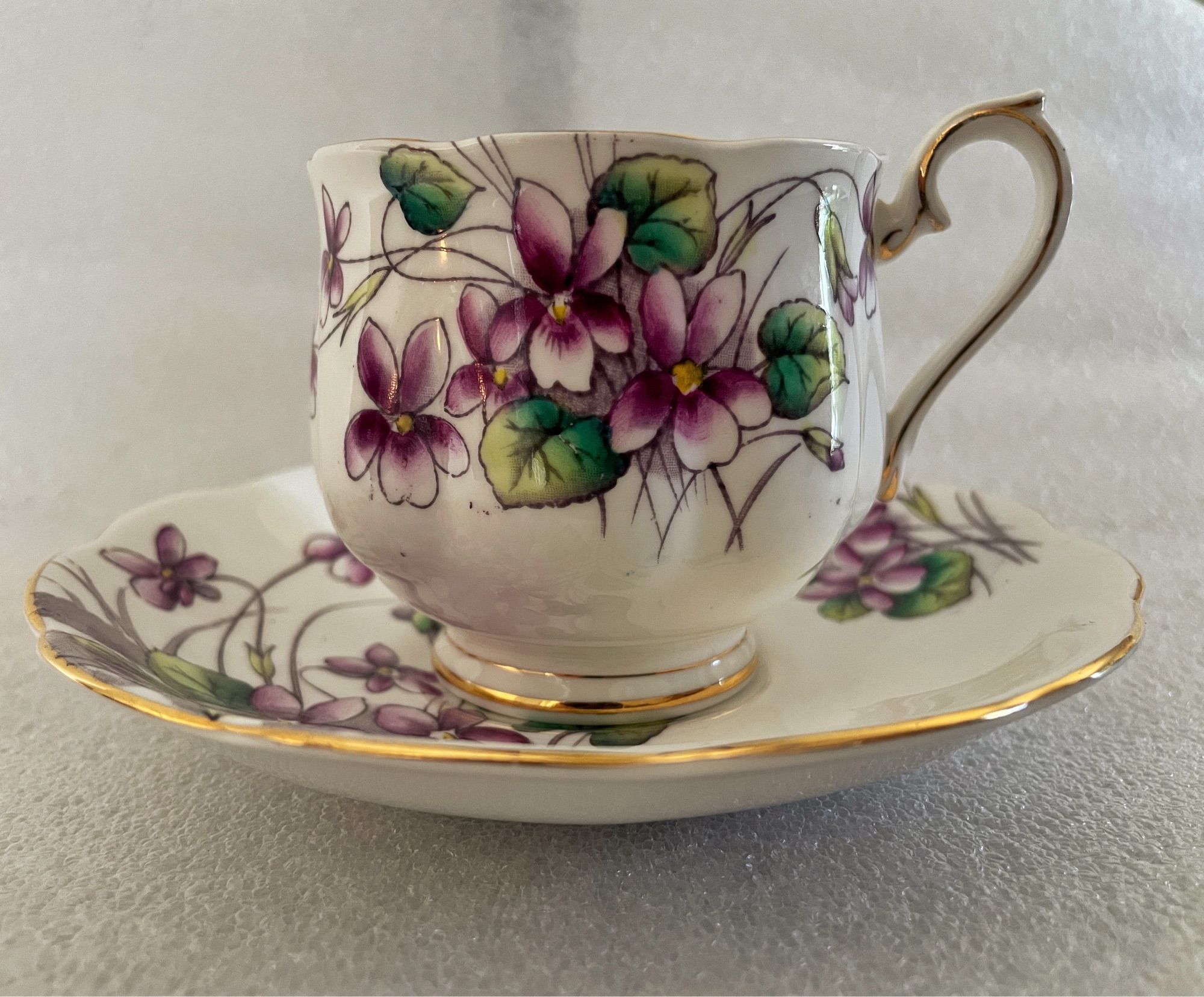 Royal Albert Teacup and saucer, violets pattern.