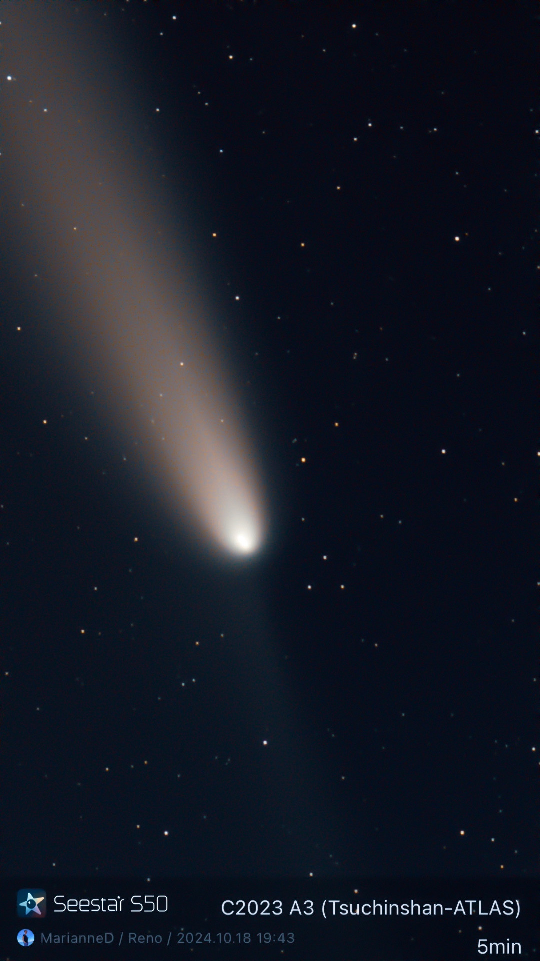 A comet through an astrophotography telescope.