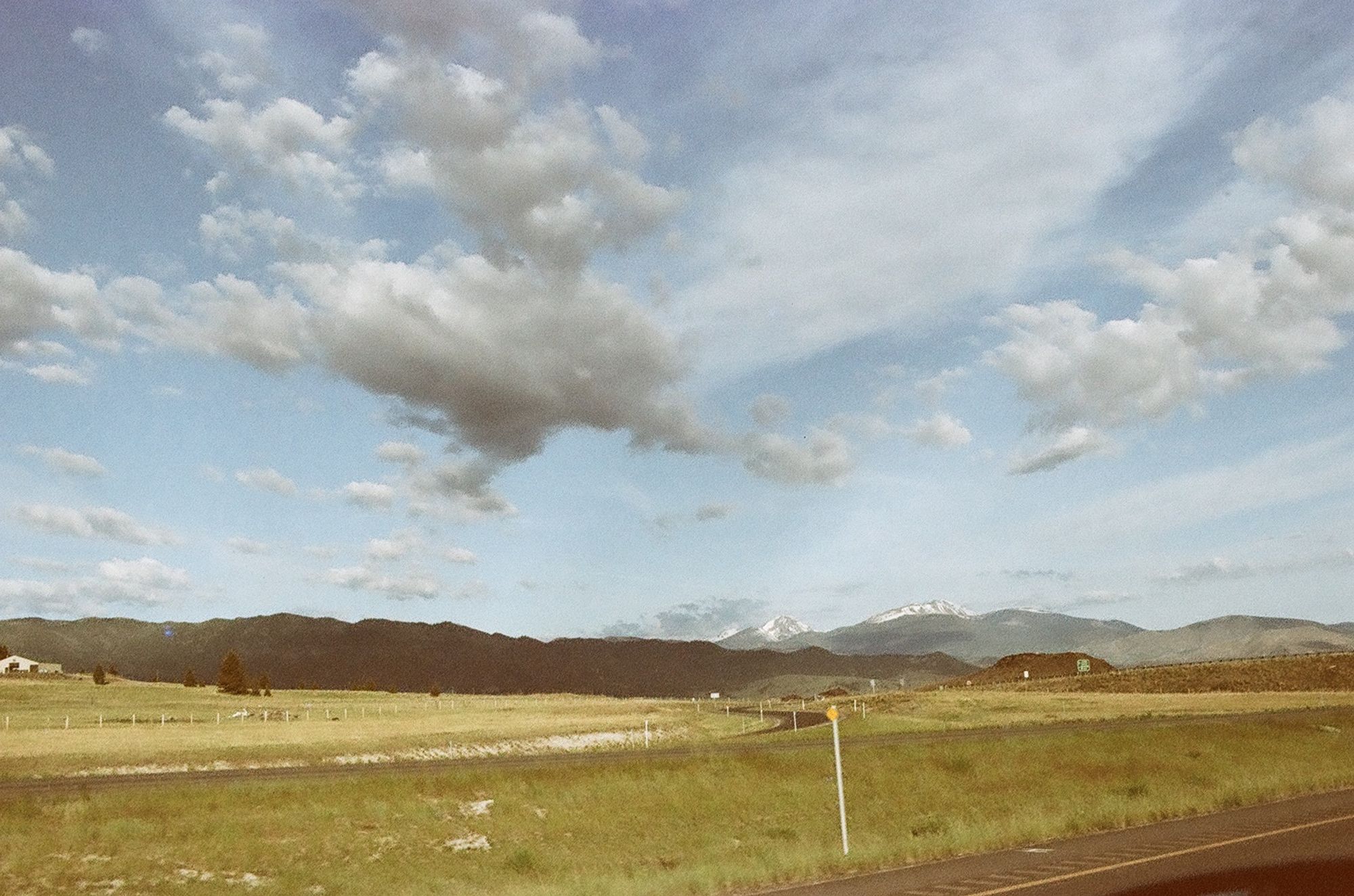 Somewhere west of Butte Montana on I-90. There’s mountains in the distance and the land is all golden. The sky is fucking huge