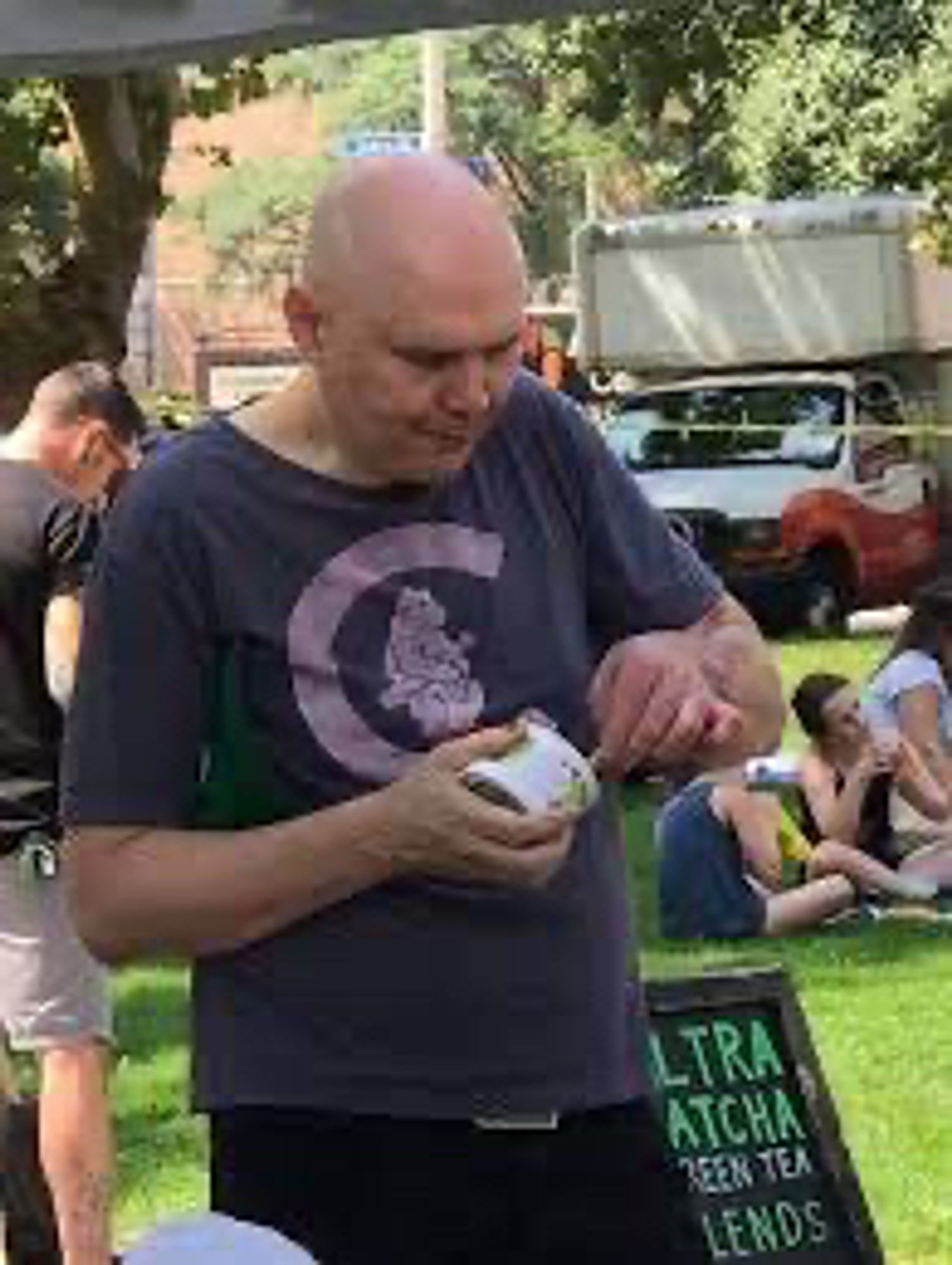 Billy Corgan eating vegan pudding at Pittsburgh Vegfest