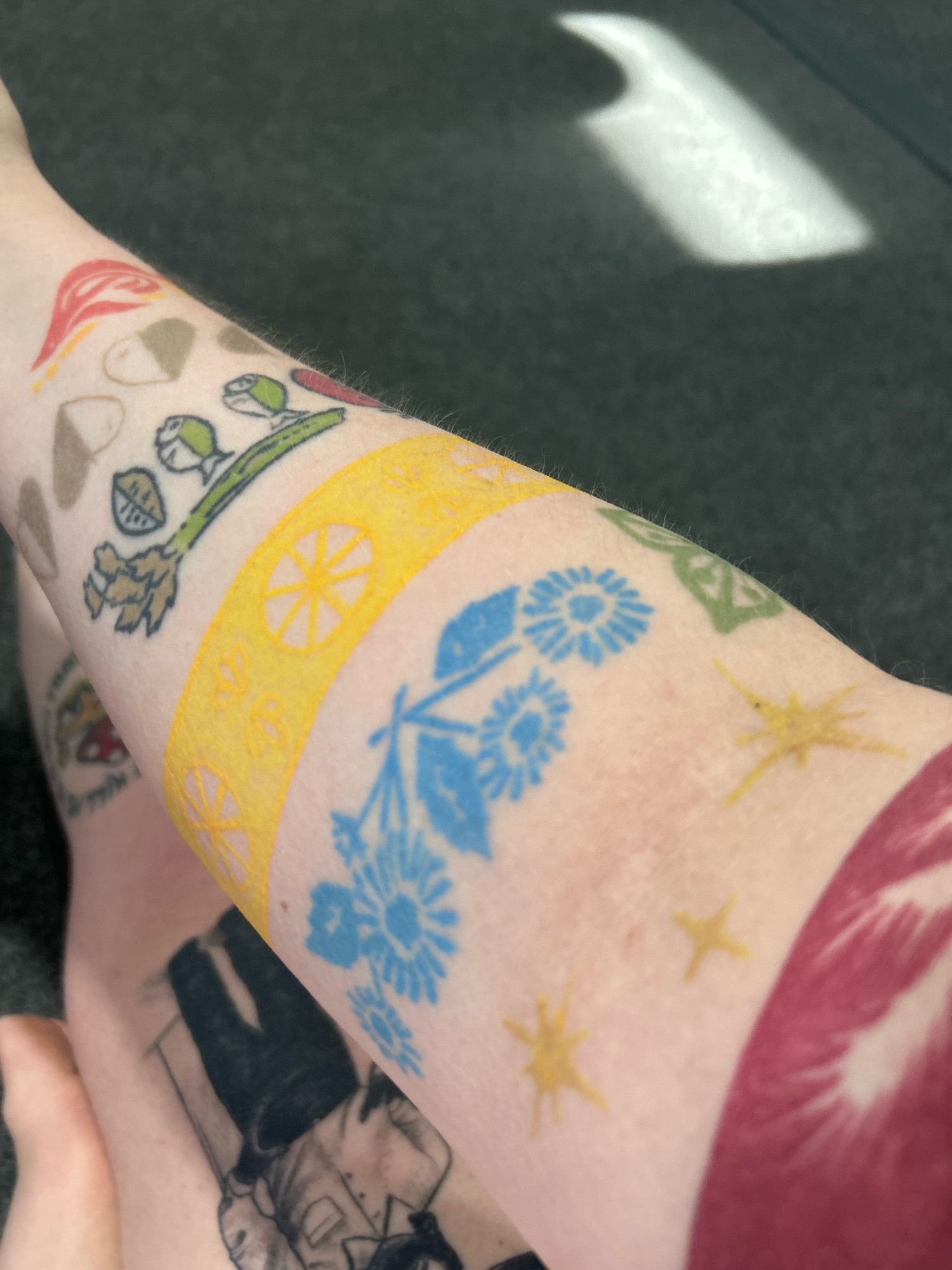 My arm with my pyrex tattoos on it