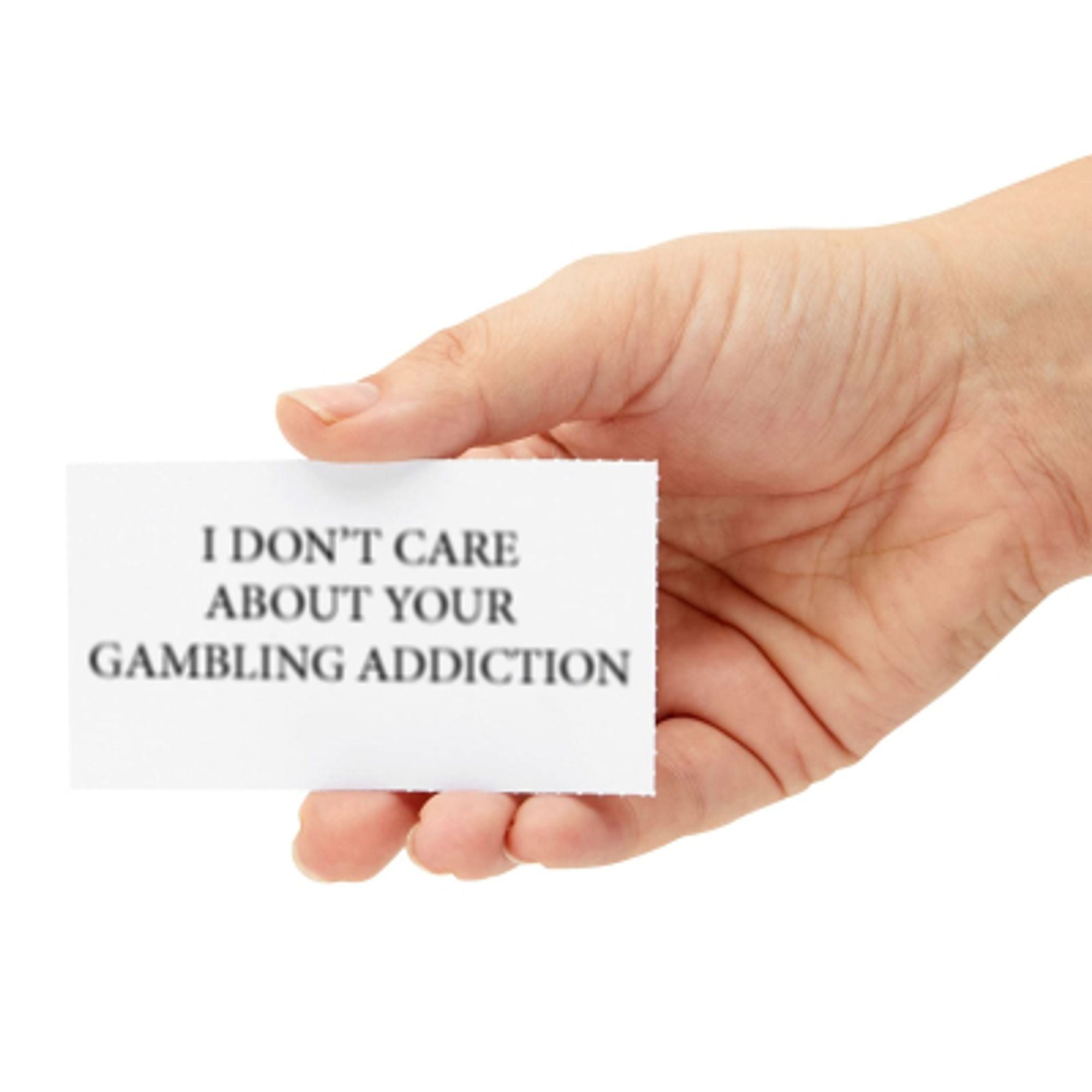 A business card being held up. The card has "I DON'T CARE ABOUT YOUR GAMBLING ADDICTION" photoshopped onto it.