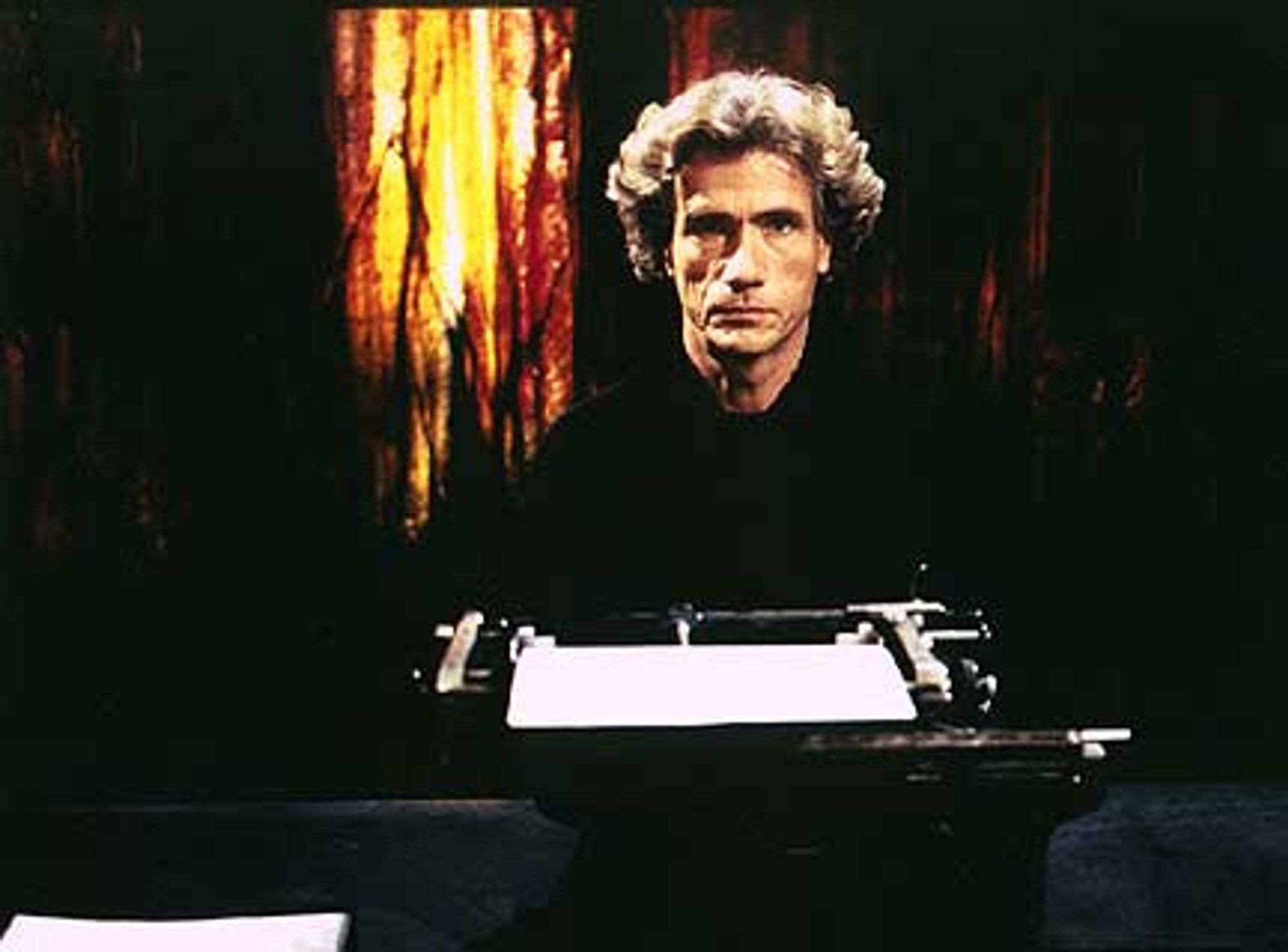 Jürgen Prochnow as Sutter Cain in the 1994 film: In the Mouth of Madness