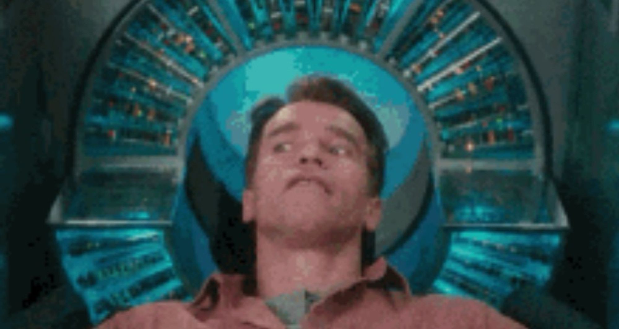 Arnold Schwarzenegger leaning back into the memory rewriting machine near the beginning of Total Recall, which I think may have been written by time travelers who specifically hate Elon