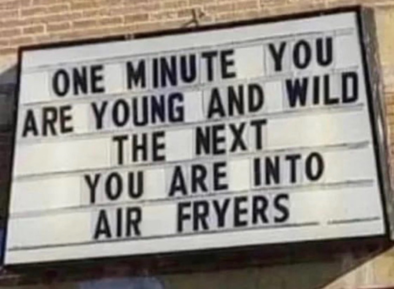 A sign board message: One minute you are young and wild, the next you are into air fryers
