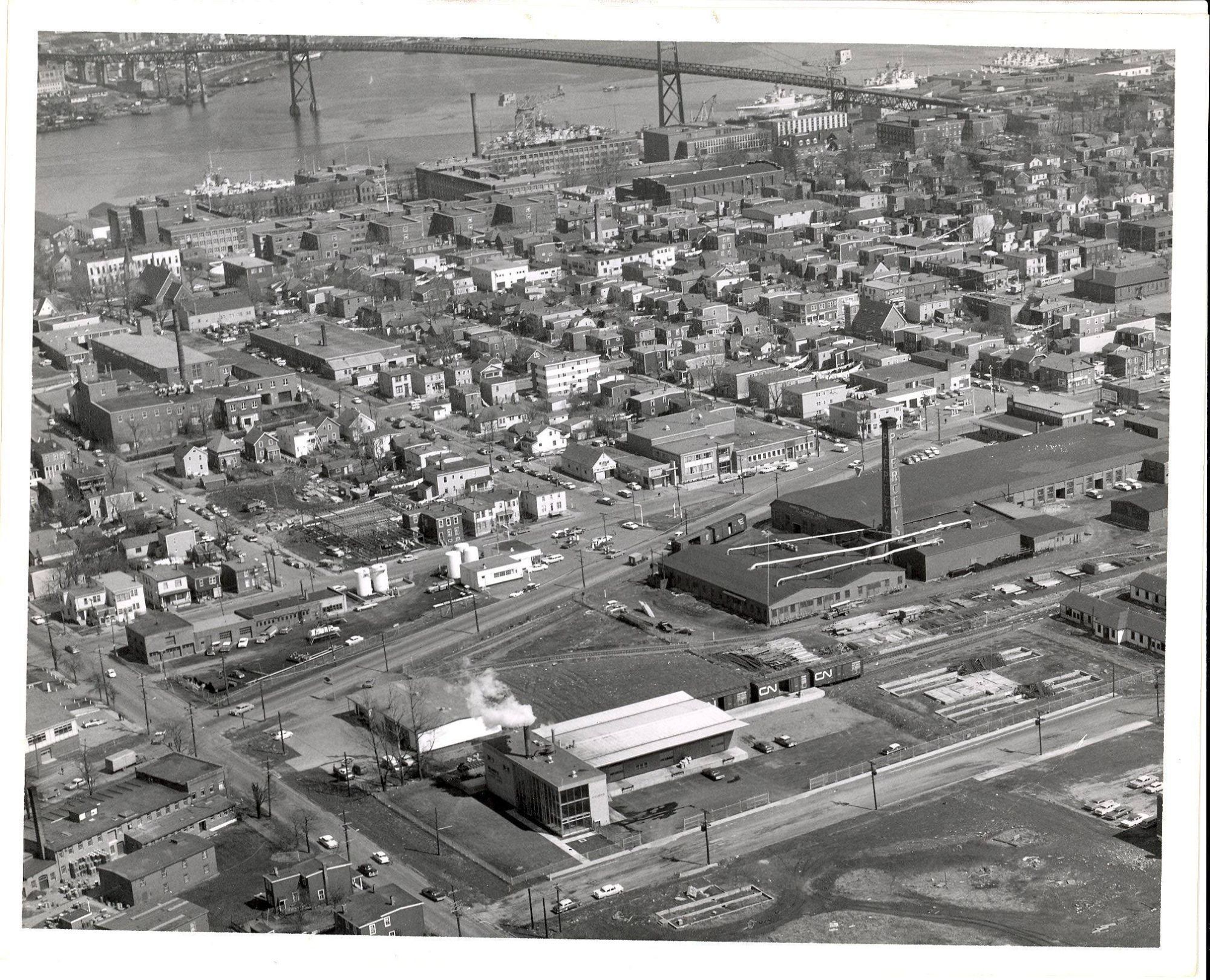 1960s aerial view of the intersection of Kempt Road and Young Street in Halifax showing various old industrial buildings and rail sidings