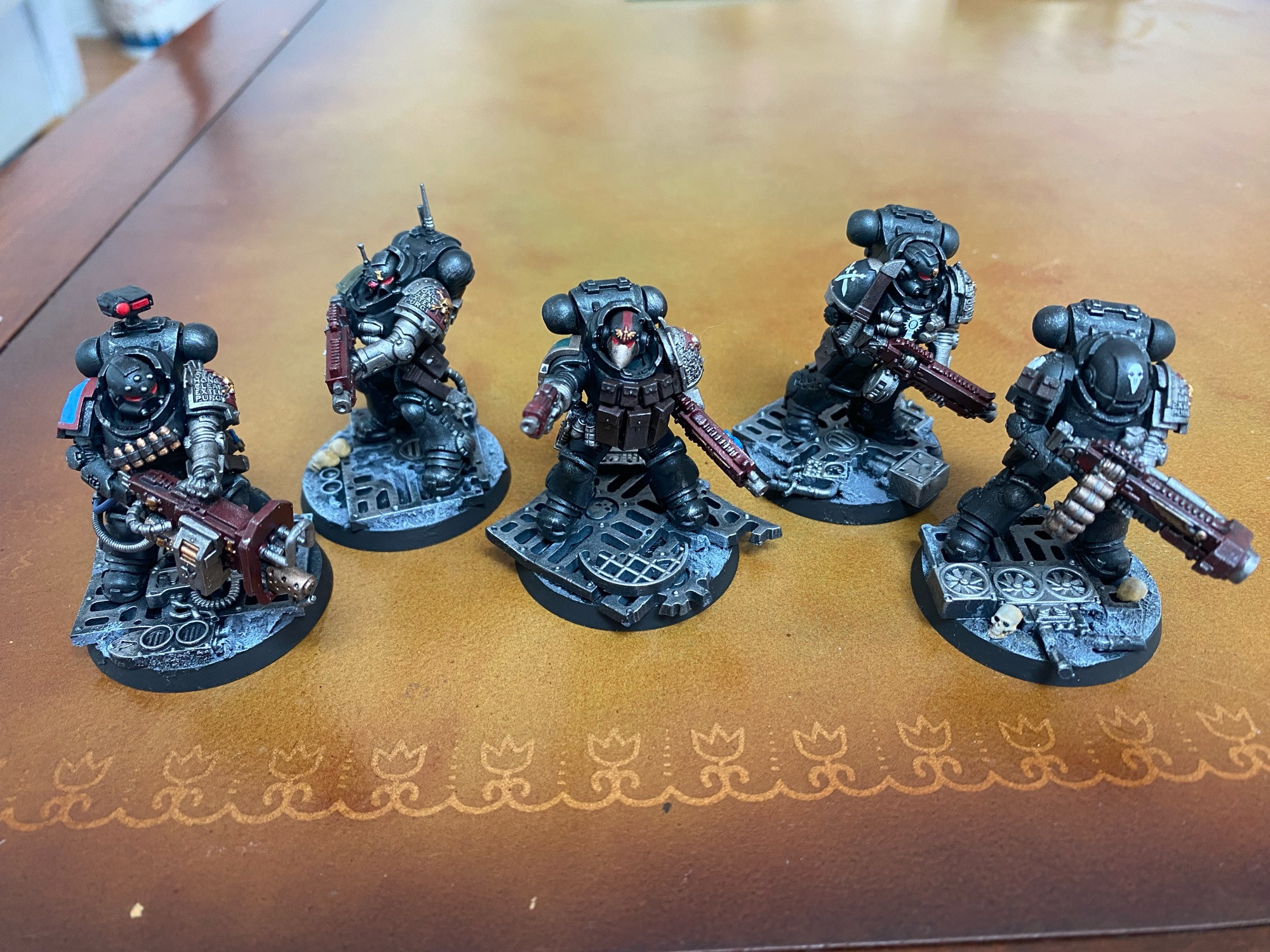 A picture of 5 Space Marine Heavy Intercessors of the Deathwatch Chapter