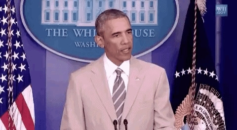 Obama in a tan suit.