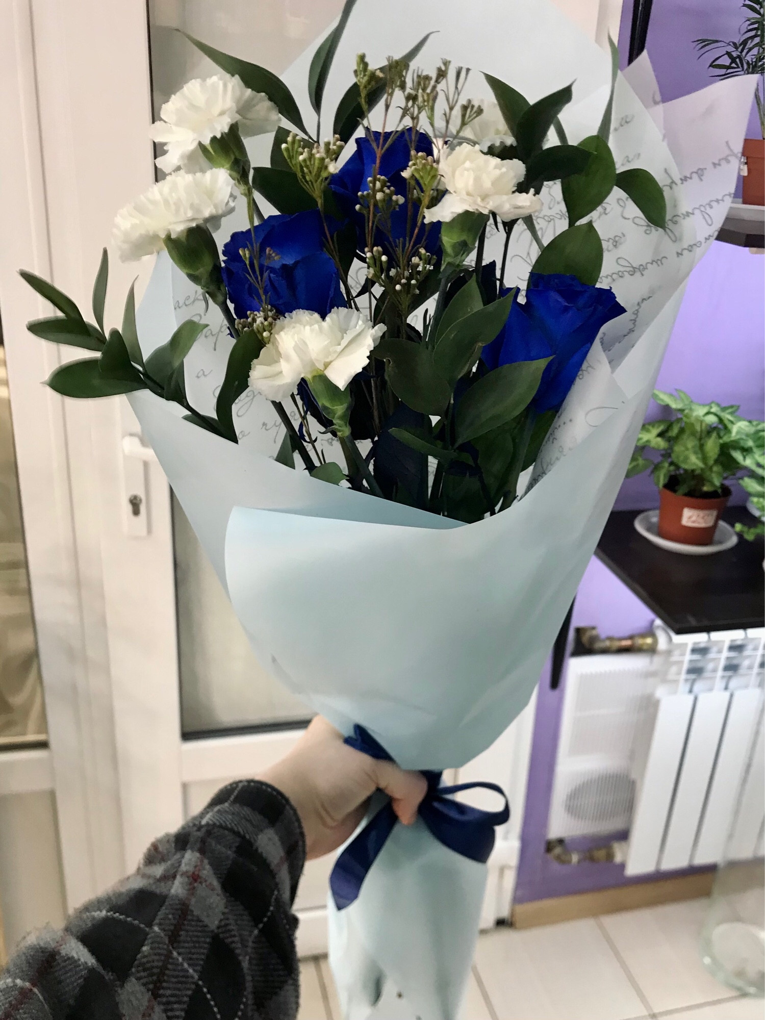 picture of the bouquet (blue roses and some other stuff)