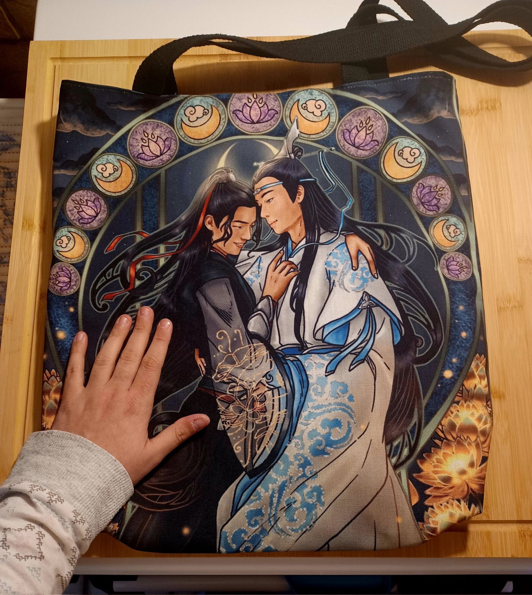 An Art Nouveau-inspired Wangxian fan art printed onto a tote bag.