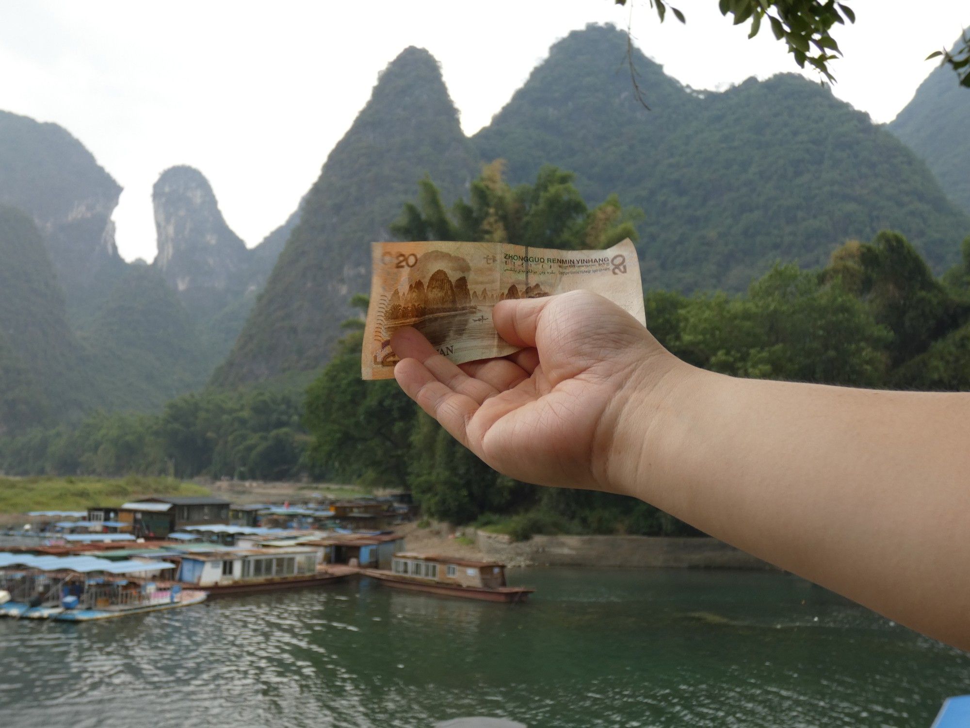 Li River scene that is depicted on the paper money, with the paper money shown