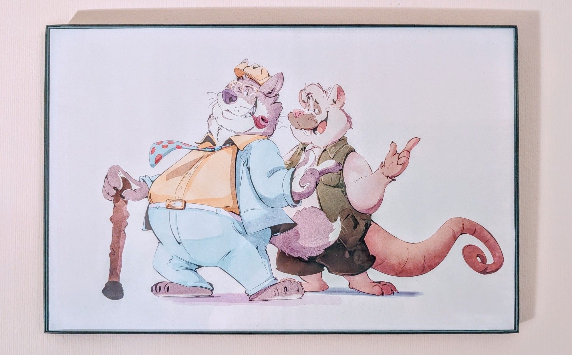 A framed print of Scribe Wolf and Indy Go Rat. Art by Eduardo / baddieholly.