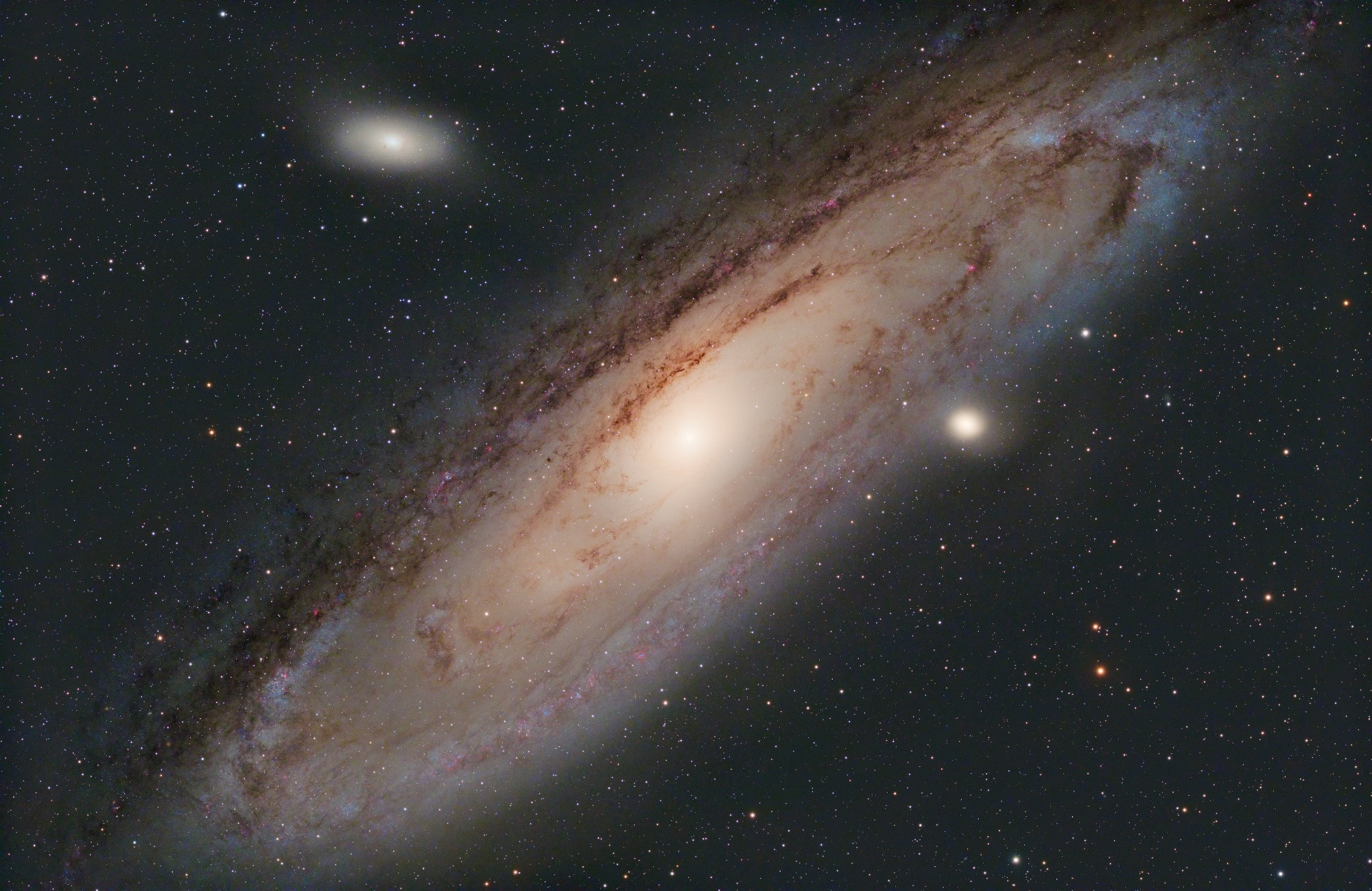 M31, the Andromeda Galaxy, shot with an 130mm f/5.2 refractor and a PlayerOne Poseidon monochrome camera and Antlia V-Pro LRGB filters. 115x60s in luminance. All RGB subs 30s. 30xB, 67xR, 63xG.