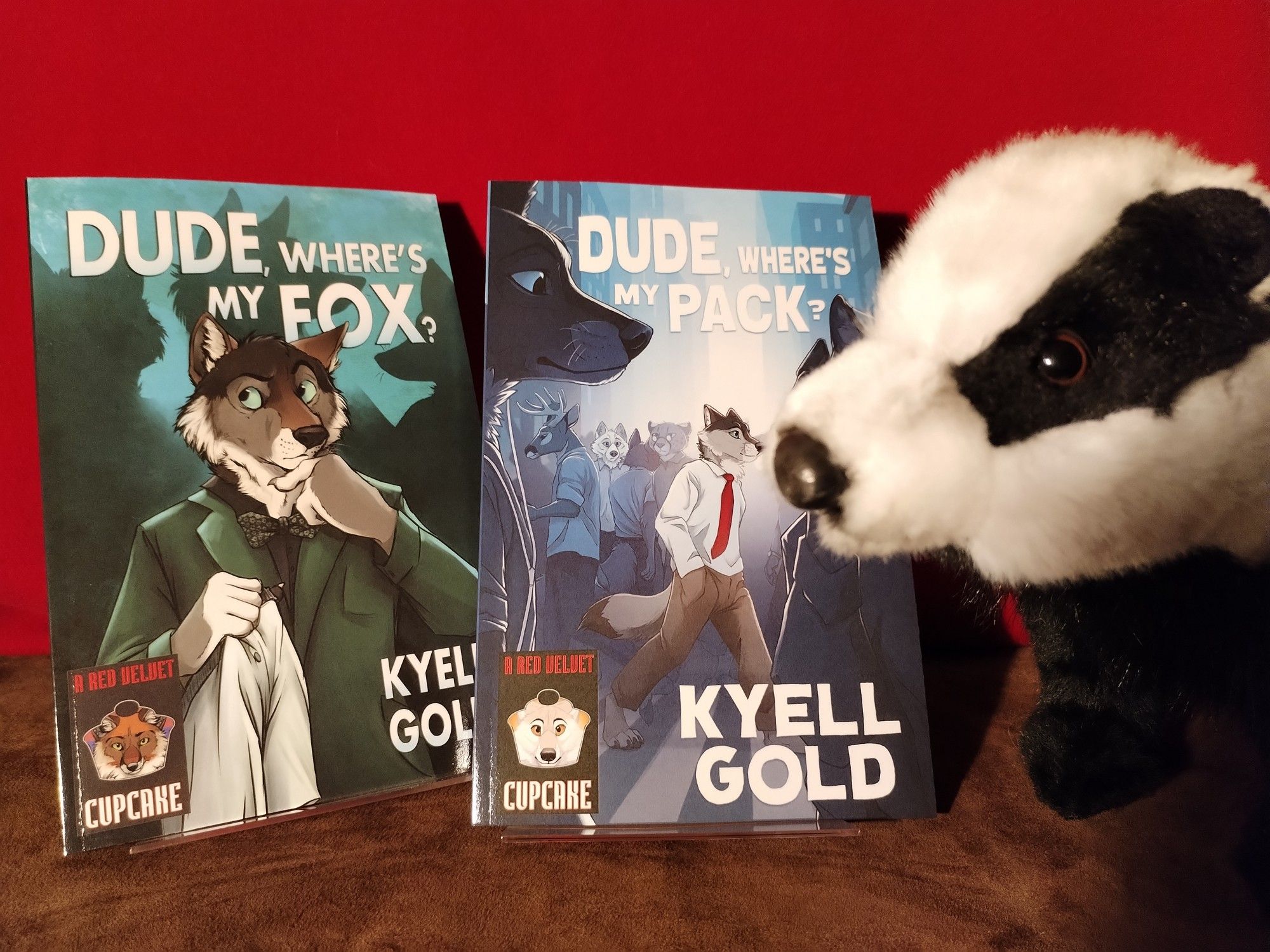 Copies of 'Dude, Where's My Fox?' and 'Dude, Where's My Pack?' by Kyell Gold