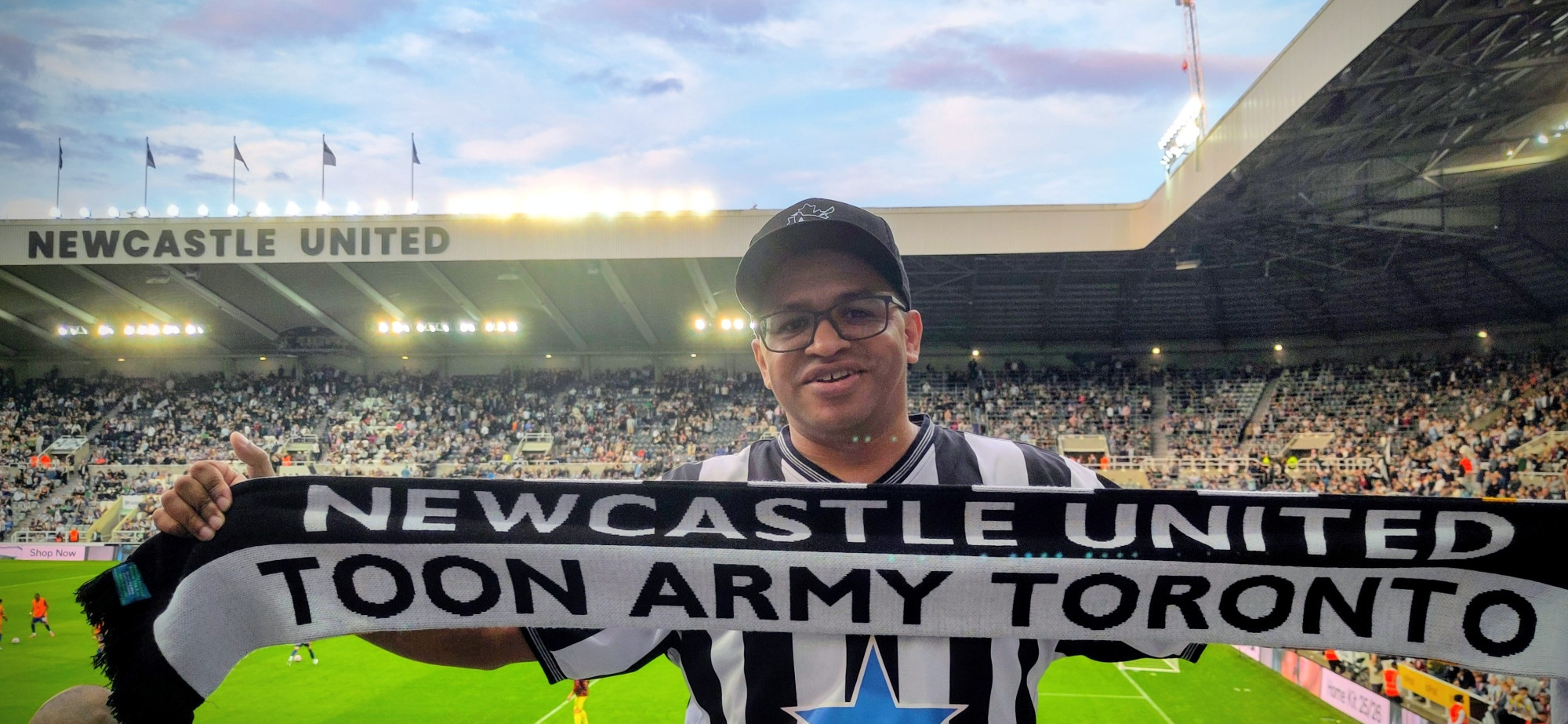 Me holding a Toon Army Toronto scarf at St James Park in Newcastle 