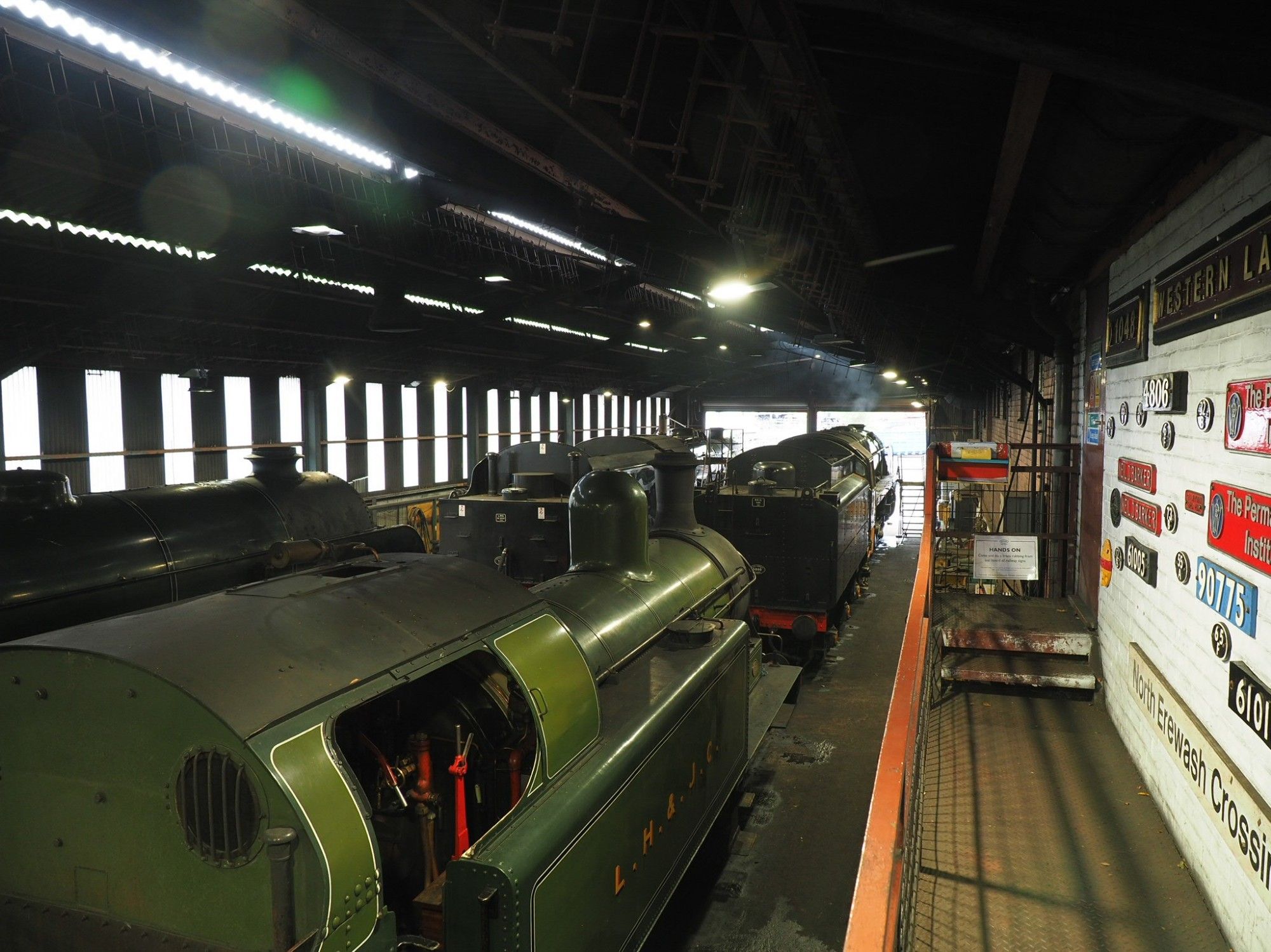 Engine shed with four stabled steam locos seen from an elevated position