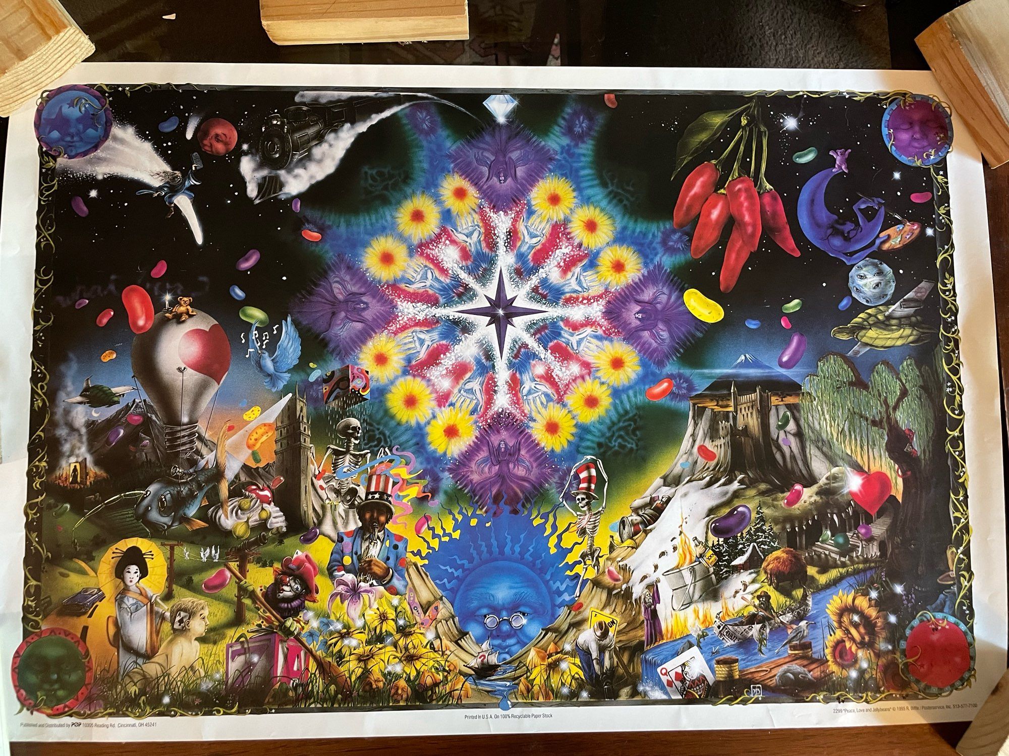 Big poster with many(or so it seems) out of place characters. Actually all the characters and objects on poster are grateful dead songs. Poster titled: Peace, Love and Jelly Beans” Upper left image is first line in the song Greatest Story Ever Told. “Moses Came Riding Out On A Quasar”