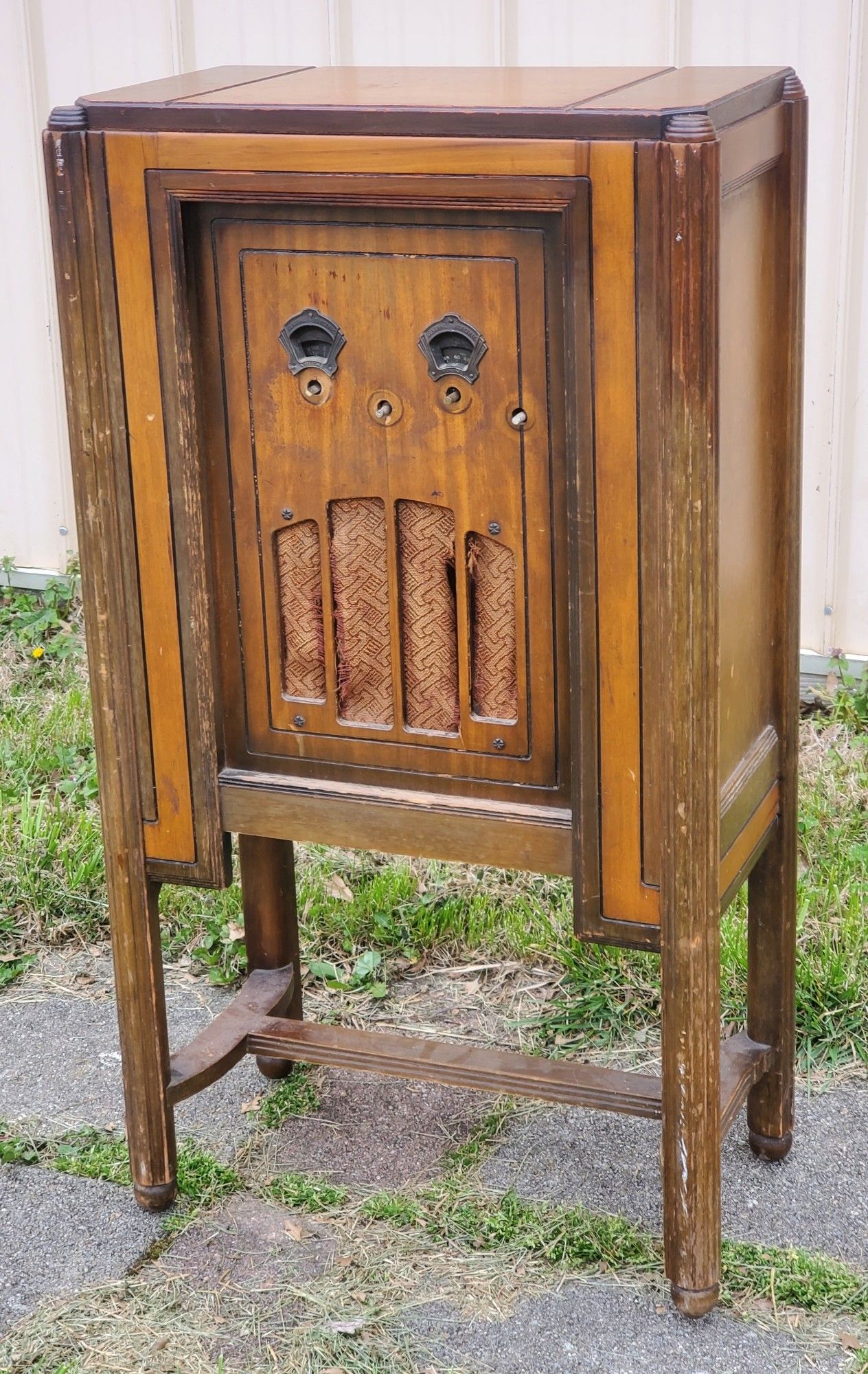 A 1933 General Electric floor standing radio model K-55 radio as found, needing cleaned and repaired