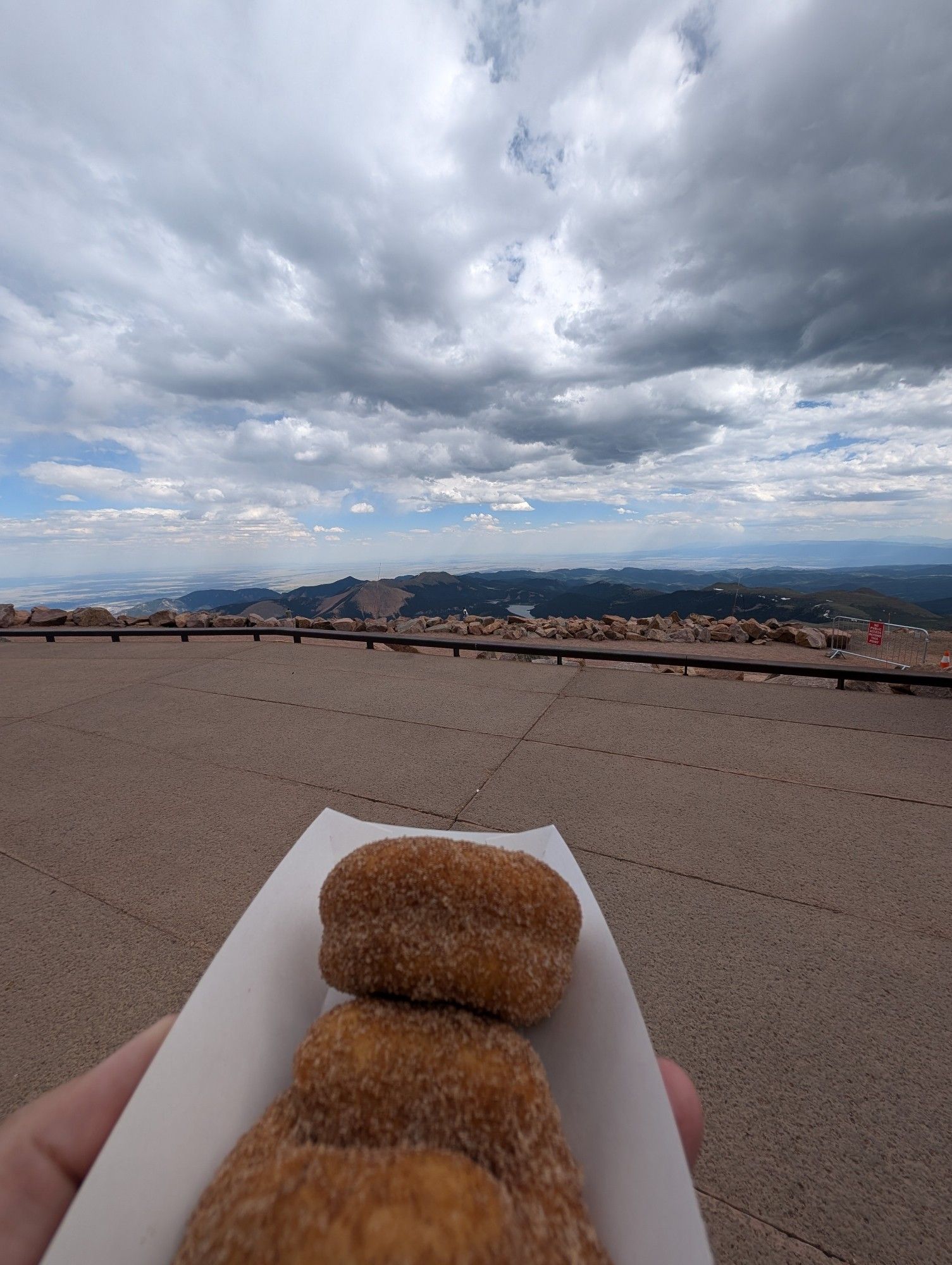 A picture of cinnamon donuts from the Pikes Peak cafe taken at 14,115ft above sea level.