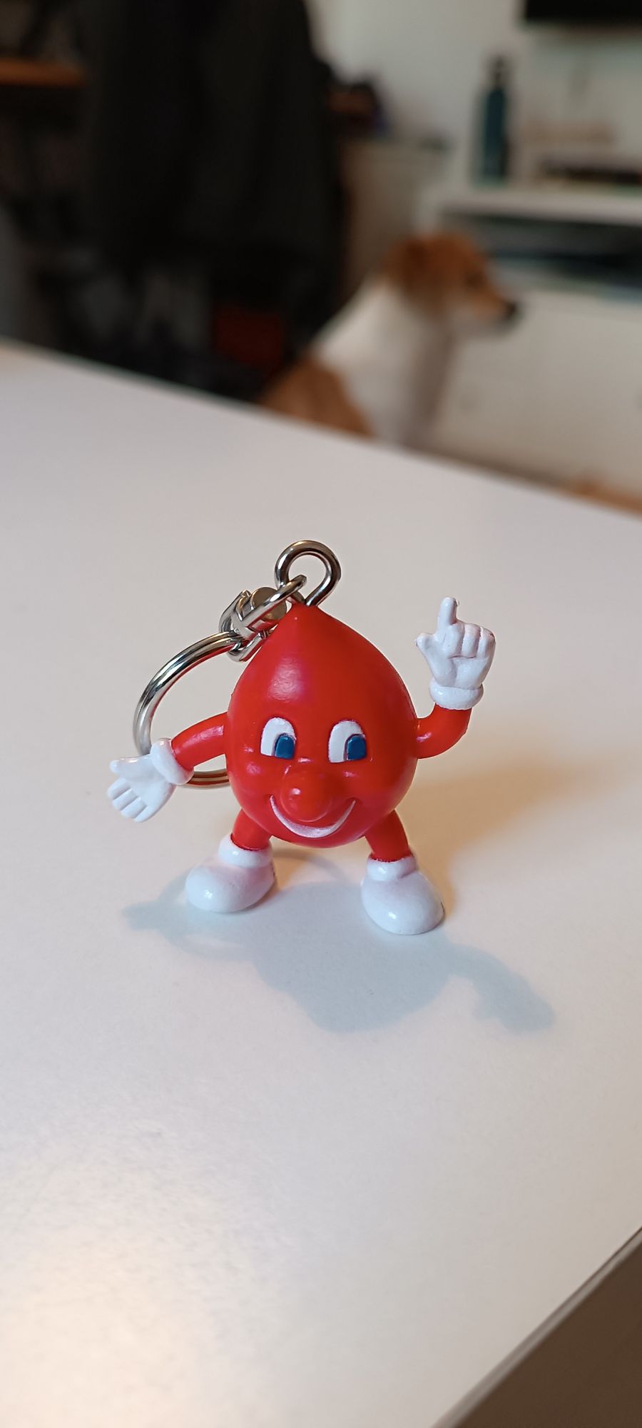 A key ring with the mascot of the German Red Cross  blood donation center 