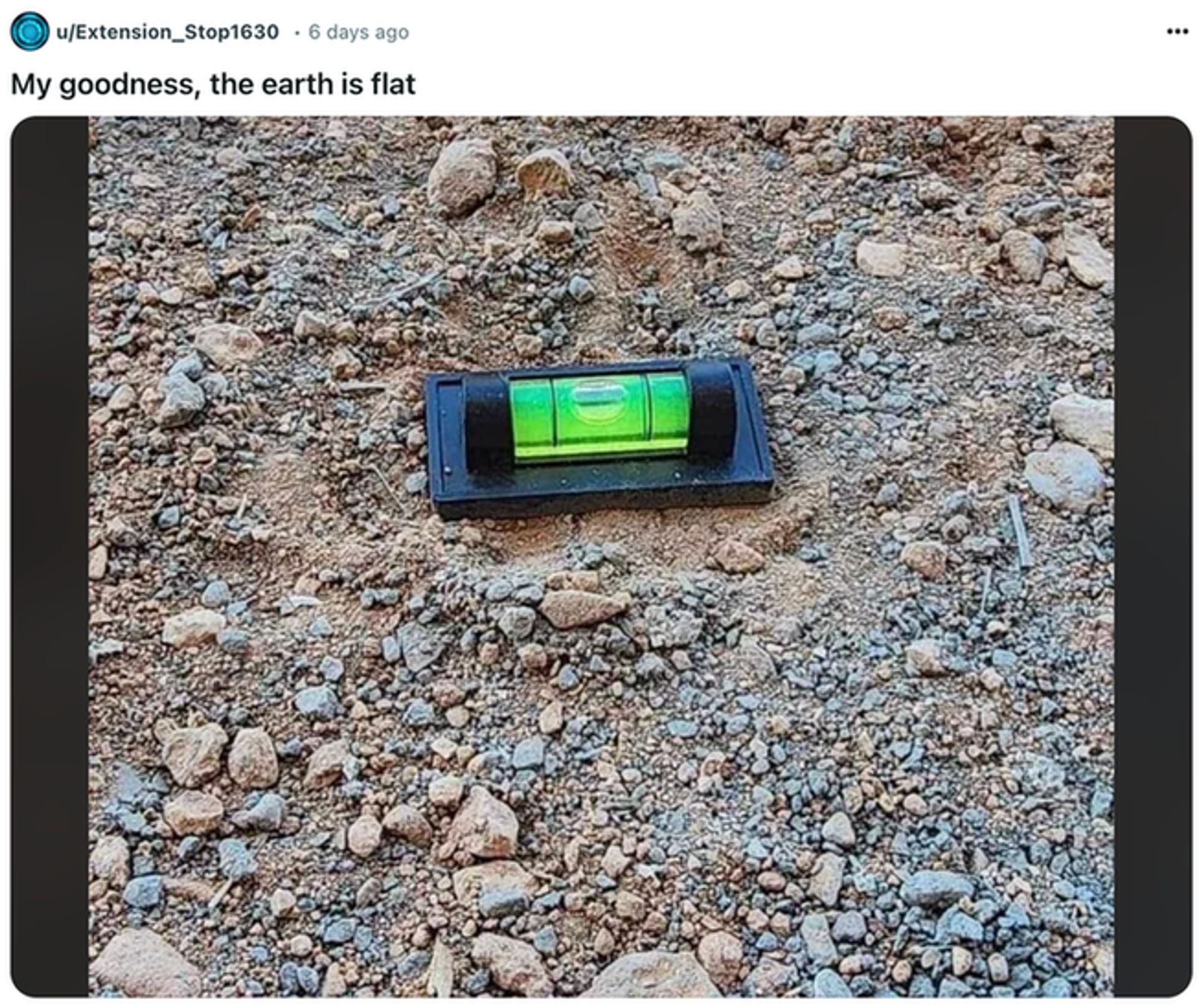 Screenshot of a Reddit post that says: 'My goodness, the earth is flat.' Attached is a photo of a level on the floor.