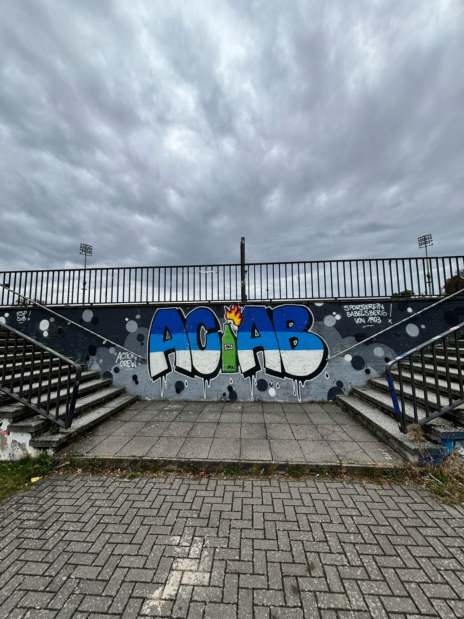 Floodlights and ACAB Sign