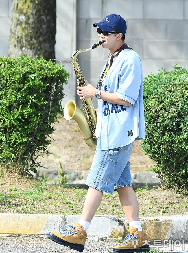 Namjoon playing the saxophone