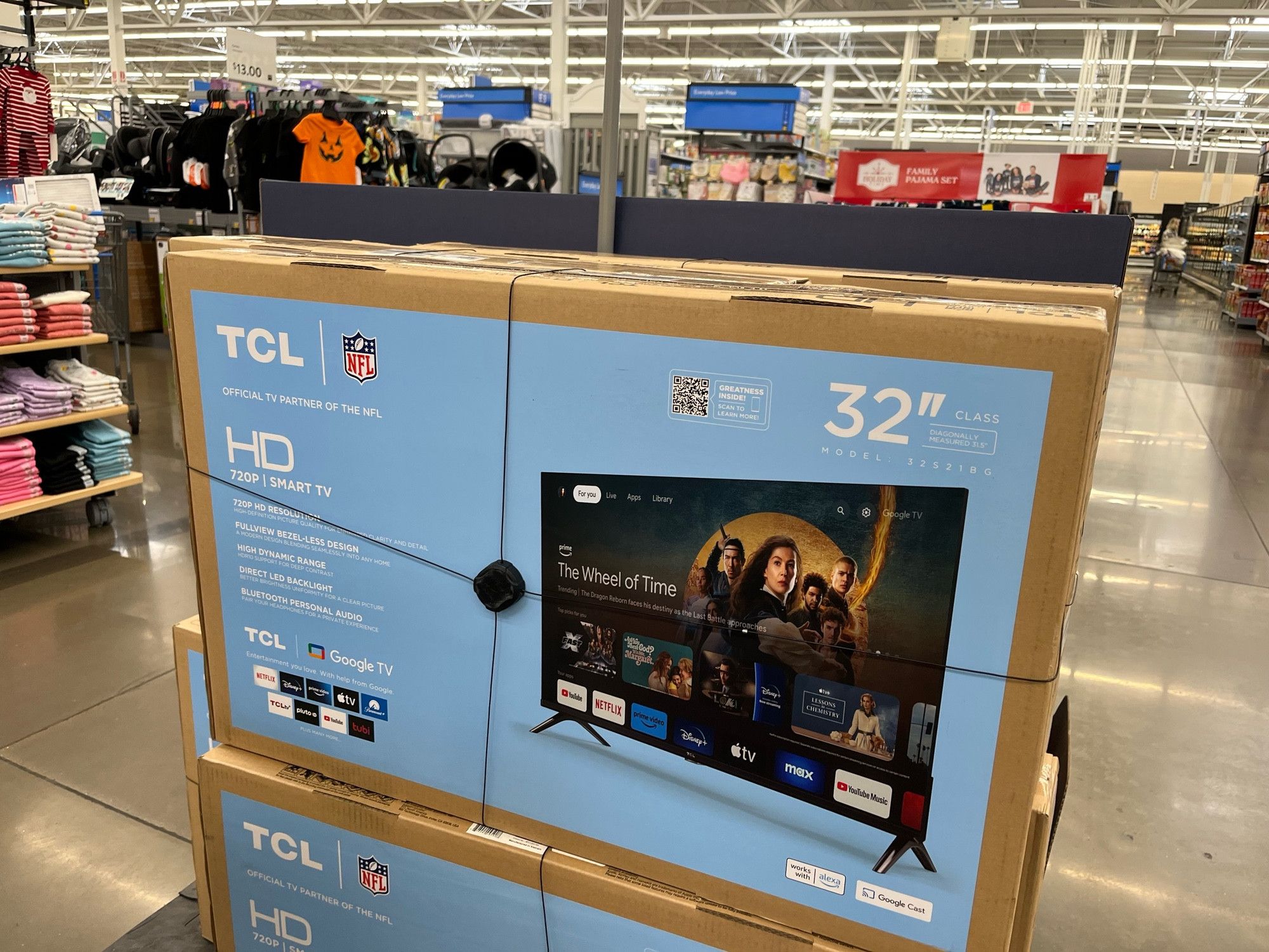 Picture from a recent trip to Walmart of a TCL 32” TV Box which shows a TV on the cover with The Wheel of Time TV Show image from Amazon Prime.