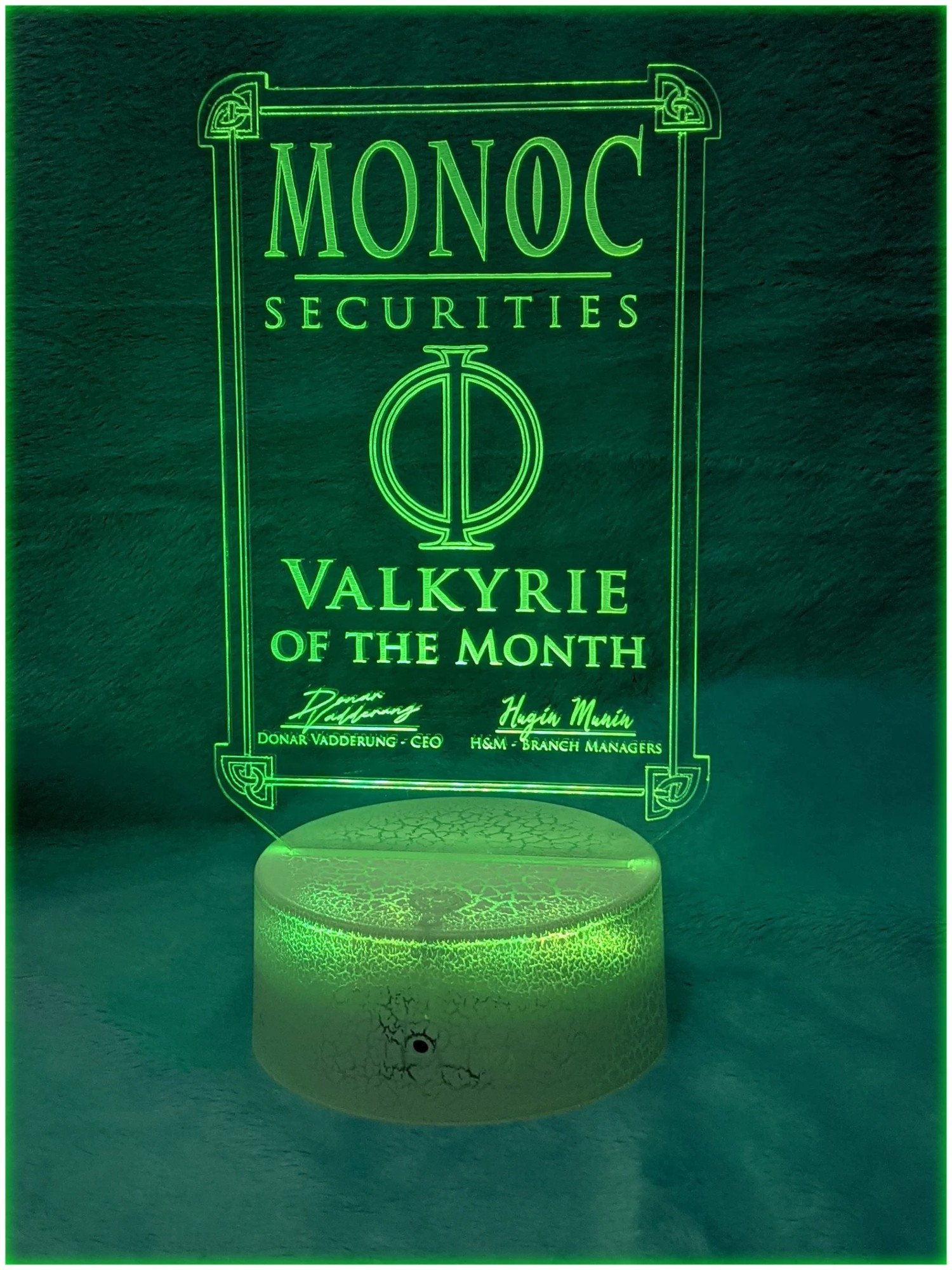 A light up display award. that reads from top to bottom
MONOC Securities Valkyrie of the Month, Signed by Donar Vadderung CEO, cosigned by Hugin and Munin, Branch Managers