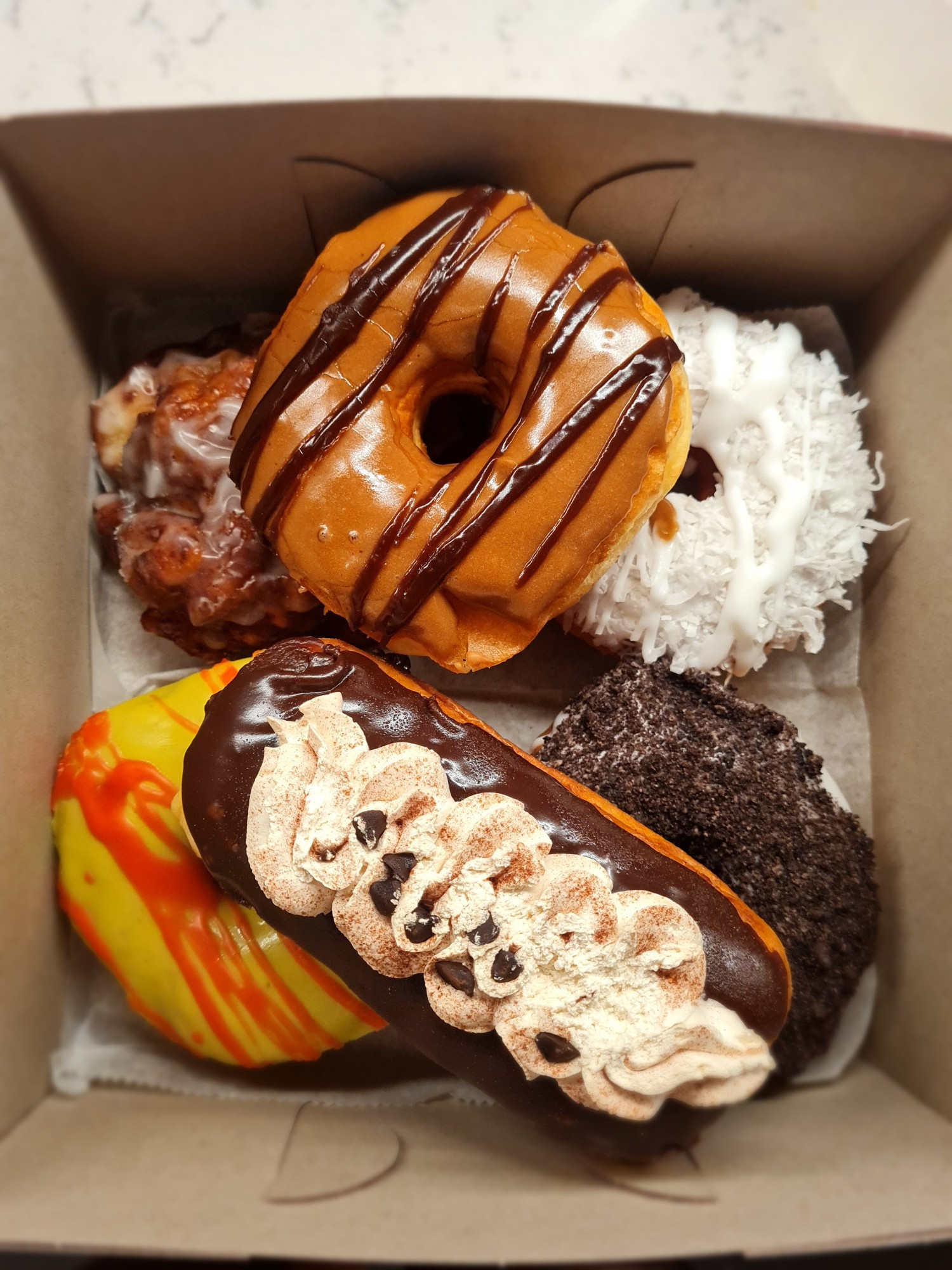 A box of fun vegan donuts 