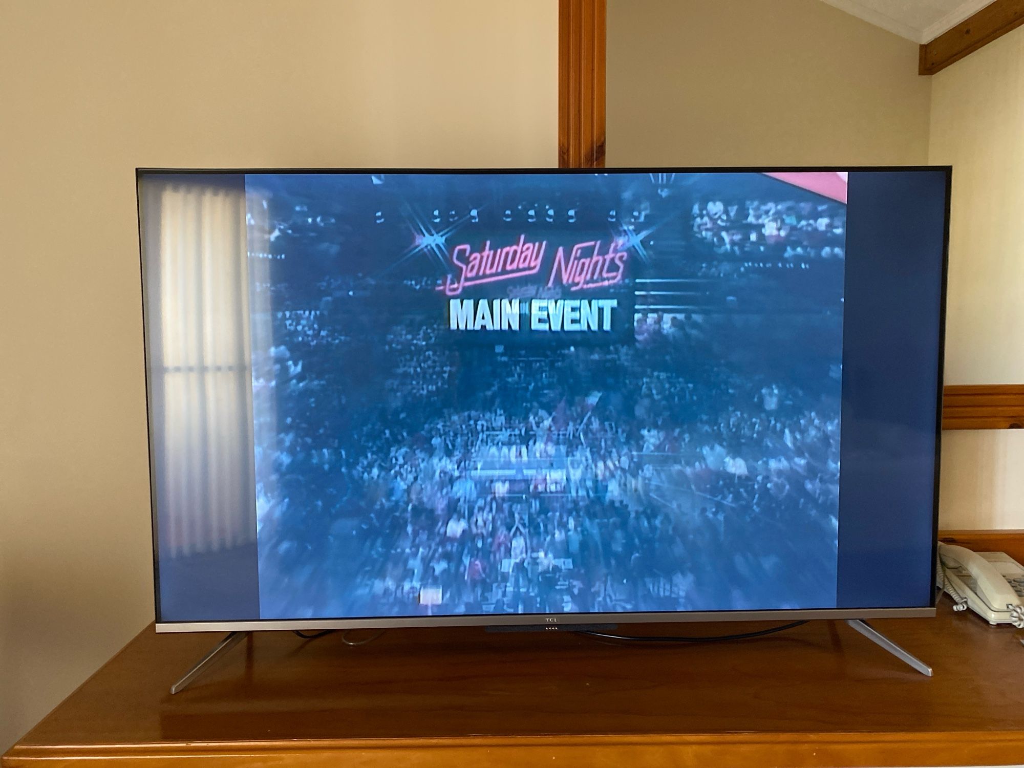 Image of a TV with the Netflix show Mr. McMahon on the screen