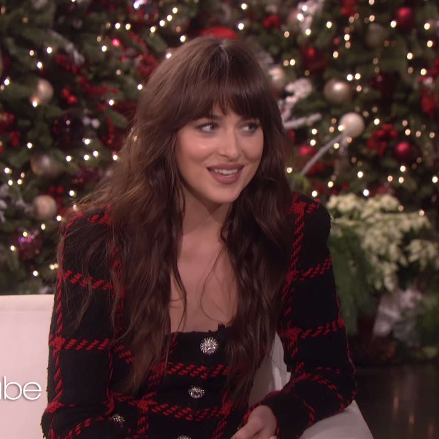 Dakota Johnson catching Ellen DeGeneres in a lie about not being invited to her birthday party in front of a live audience.