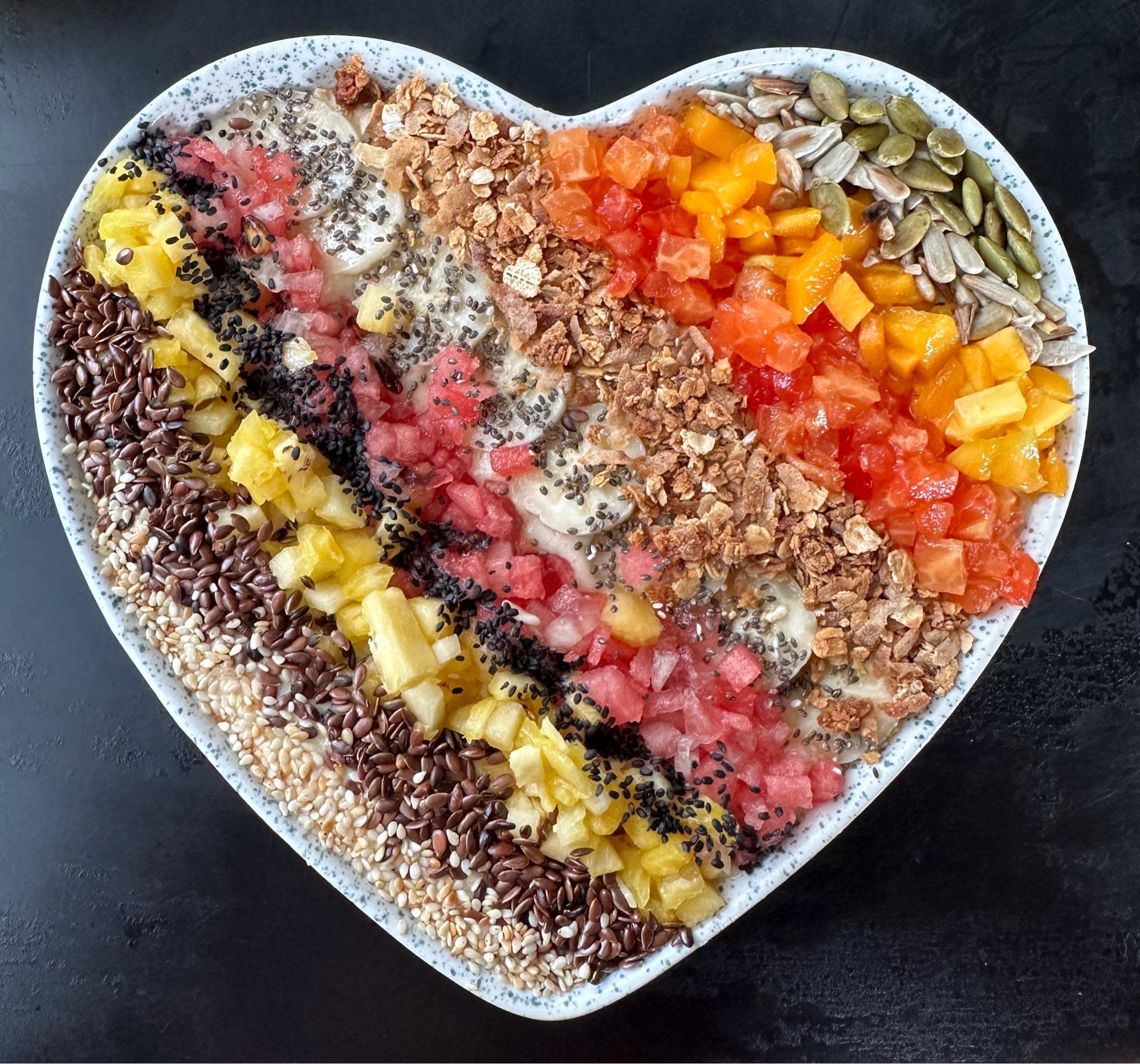 Fruit and coconut milk smoothie bowl.