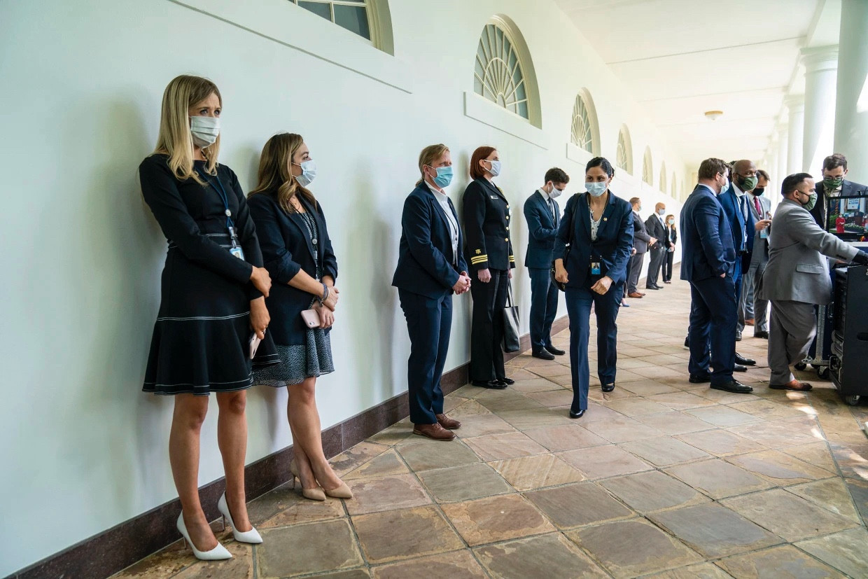 Young West Wing denizens wearing masks.