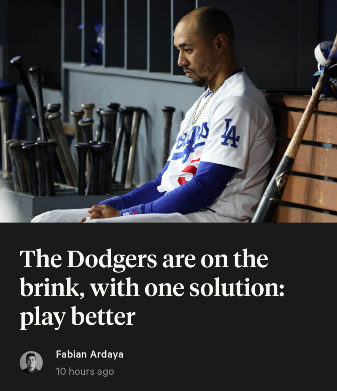 a screenshot of an LA times sports article, with a picture of Dodgers player Mookie Betts looking sad. The headline reads "The Dodgers are on the brink, with one solution: play better"