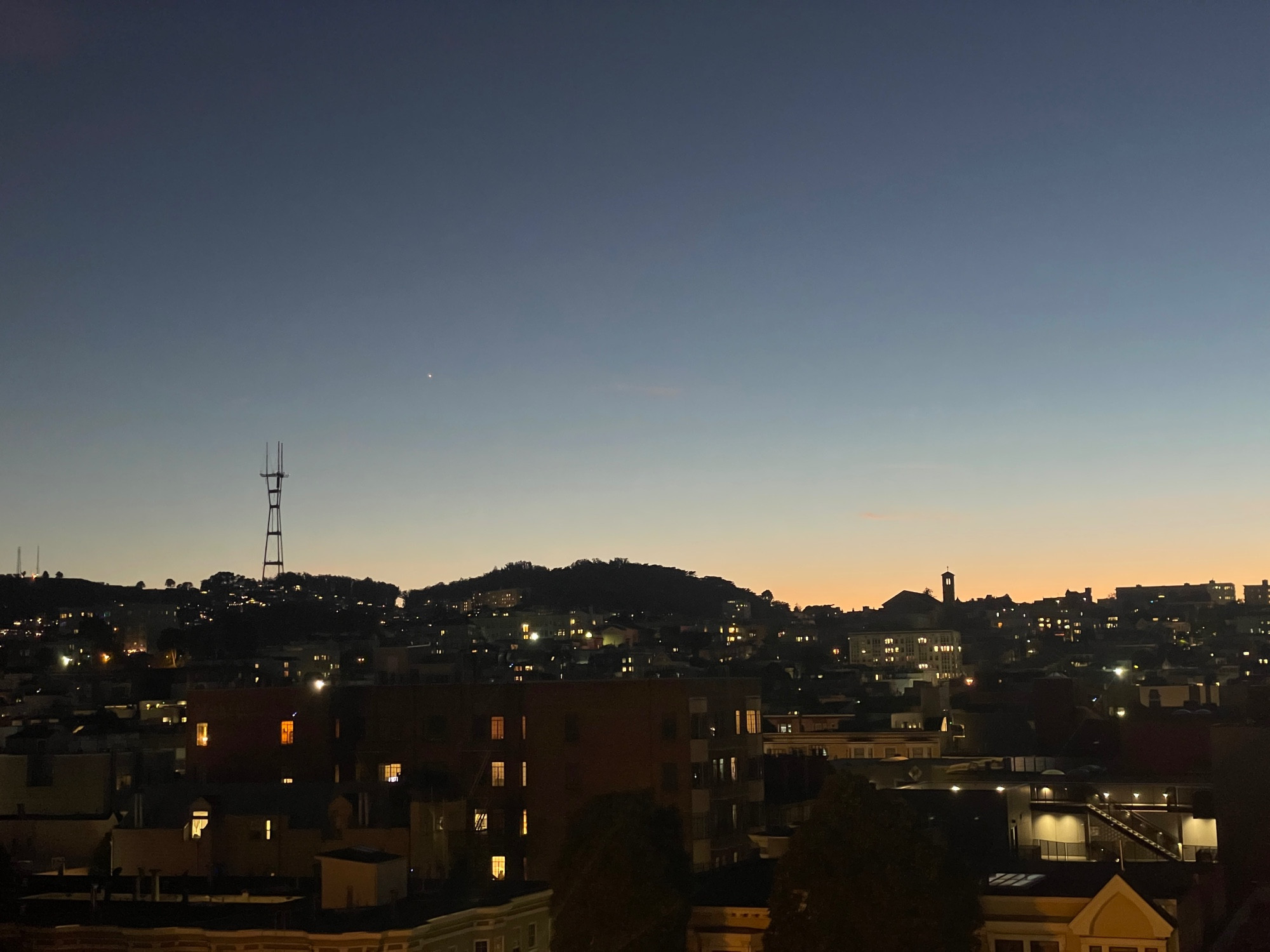 Western hills of San Francisco at twilight, featuring Sutro Tower and possibly Venus 