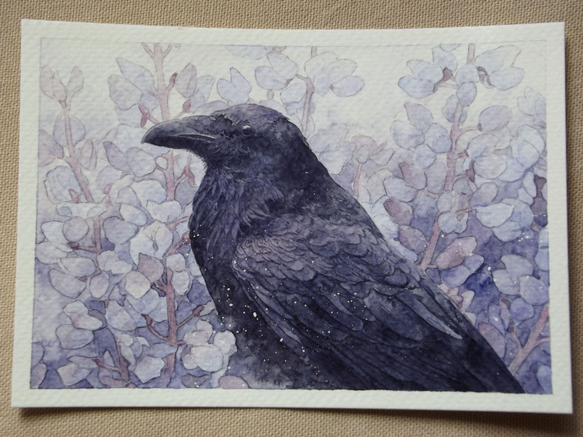 watercolor painting, a raven in the middle of lupins. Its feathers have a purple sheen, like the color of the flowers.